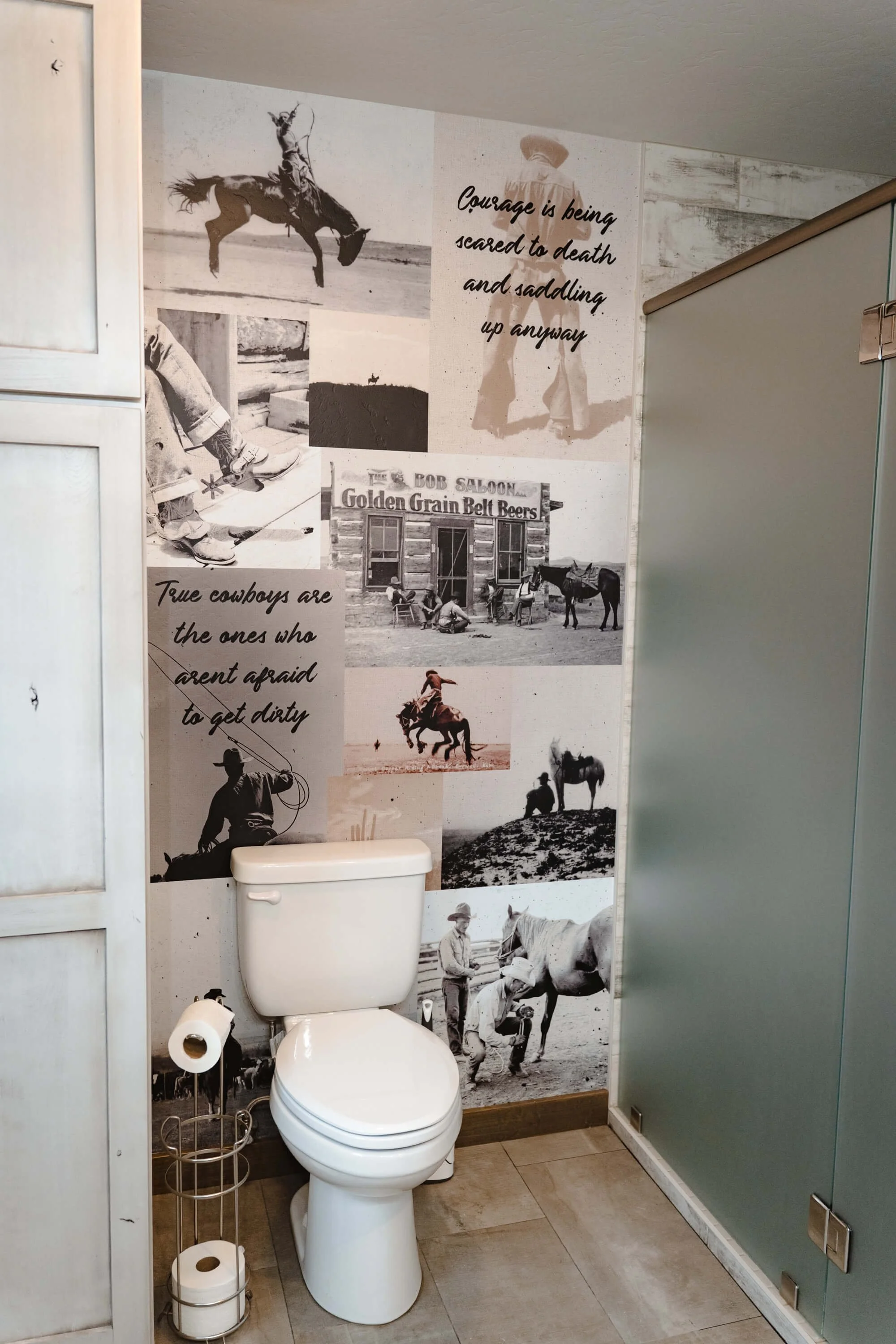 Bathroom wall vinyl wall wrap with a collage of vintage western photographs with multiple quotes overlaid