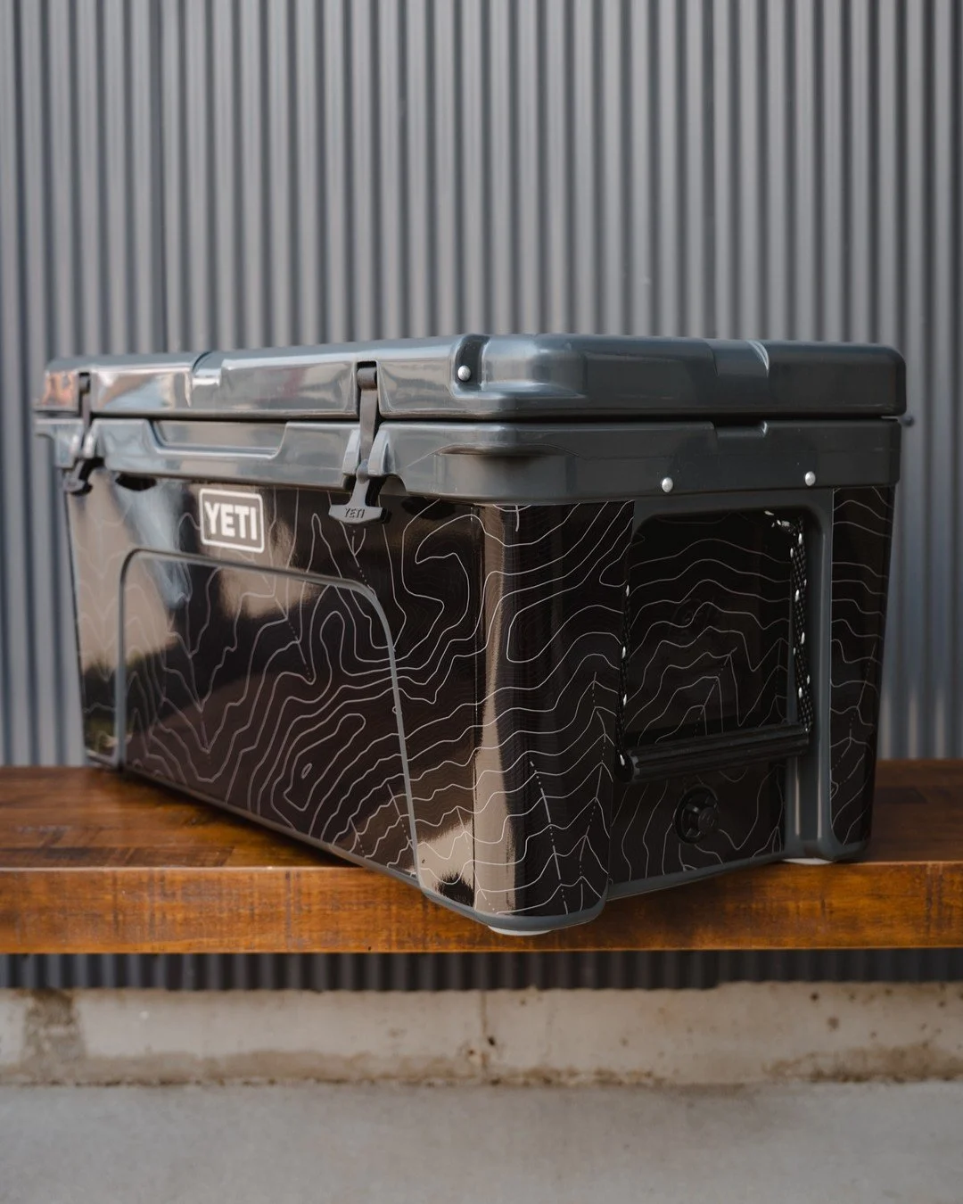 Turning cool into cooler. 🤘 This charcoal YETI now carries a black Bridger Mountain topo map wrap&mdash;stealthy style that&rsquo;s as tough as the trails it&rsquo;s built for. 🏔️❄️ 

#yeticooler #customvinylwrap #bridgermountains #topomapstyle #wr
