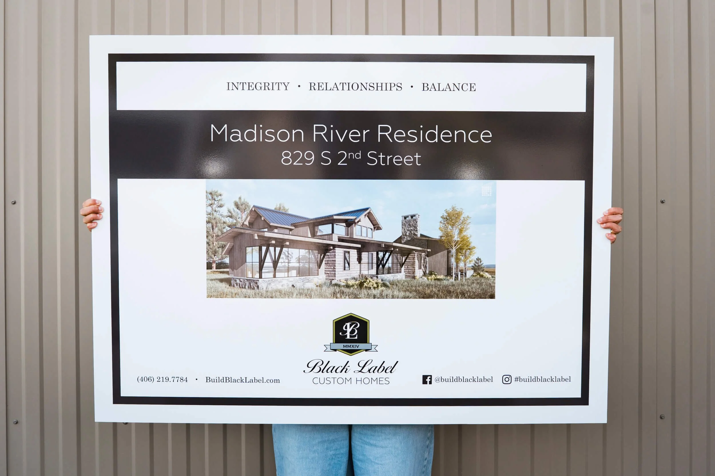 Bozeman custom sign for Madison River Residence by Black Label Custom Homes featuring a printed rendering of the house. Durable, eye-catching signage for residential real estate marketing.
