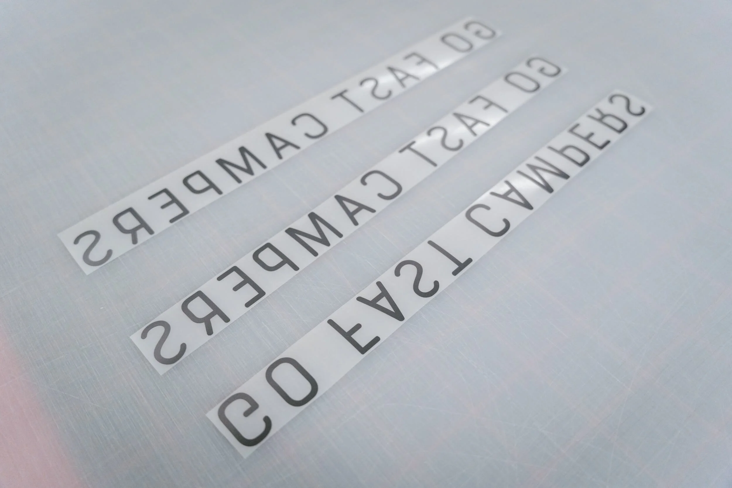 Custom transfer decals and vinyl lettering for Go Fast Campers.