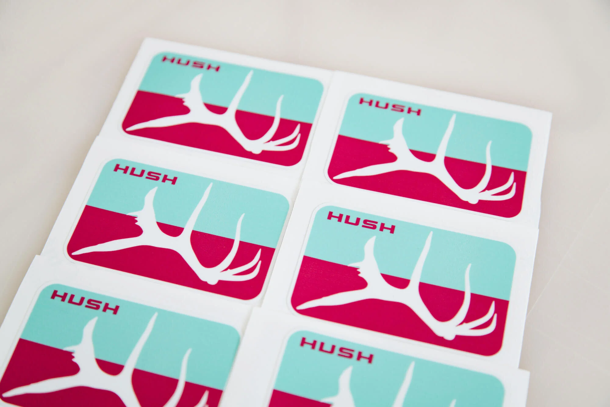 Duotone sticker sheets designed for HUSH.