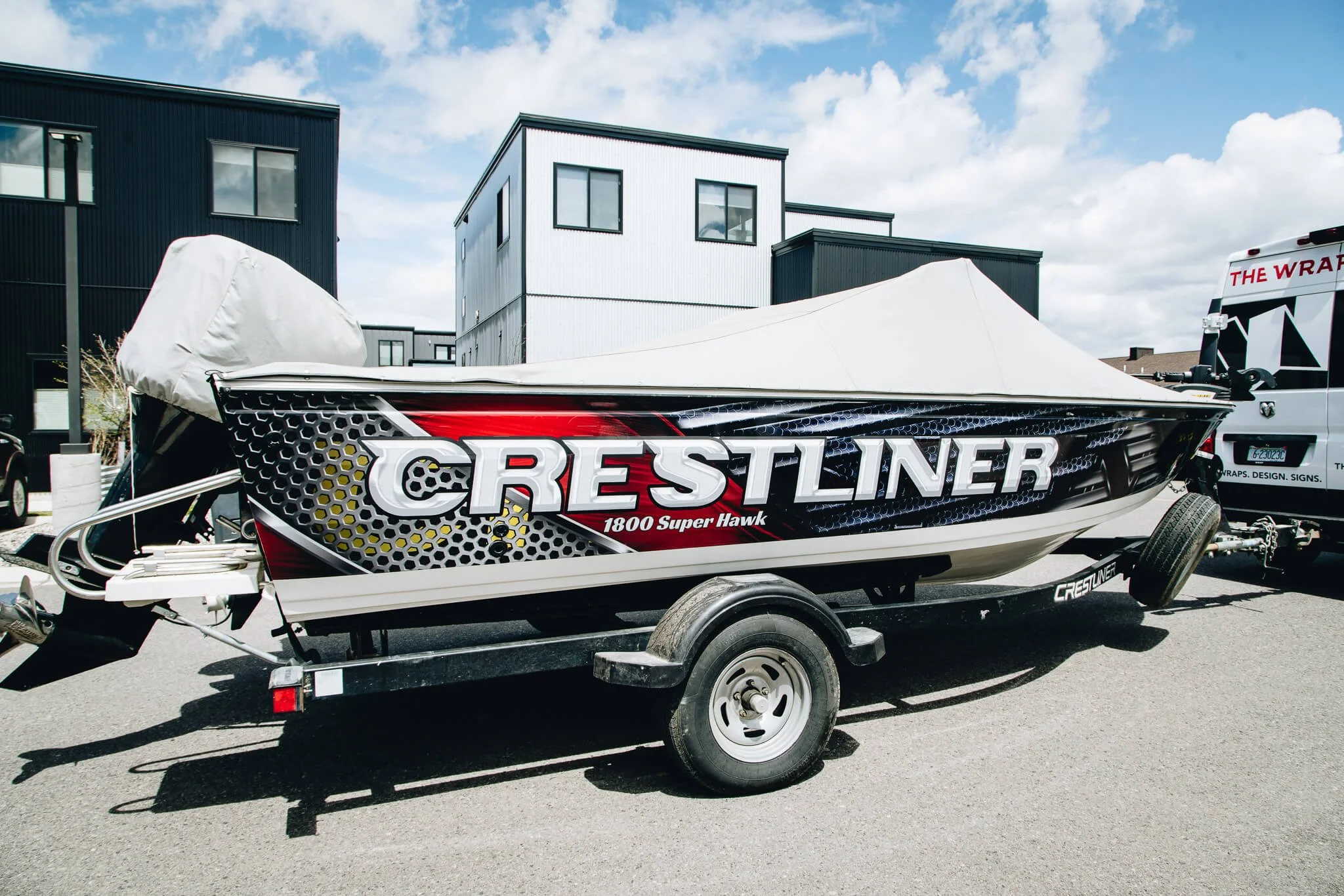 A Crestliner 1800 Super Hawk boat with a custom-designed full wrap.