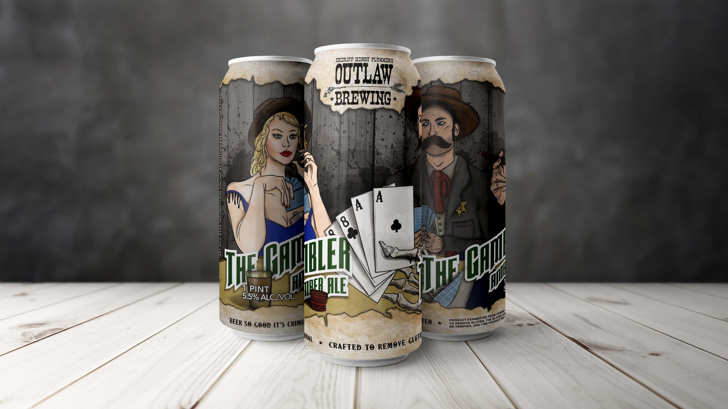 Three beer cans of The Gambler Amber Ale from Outlaw Brewing with vintage Western-inspired artwork, featuring a woman holding playing cards, a man with a mustache, and an image of playing cards on the label. 