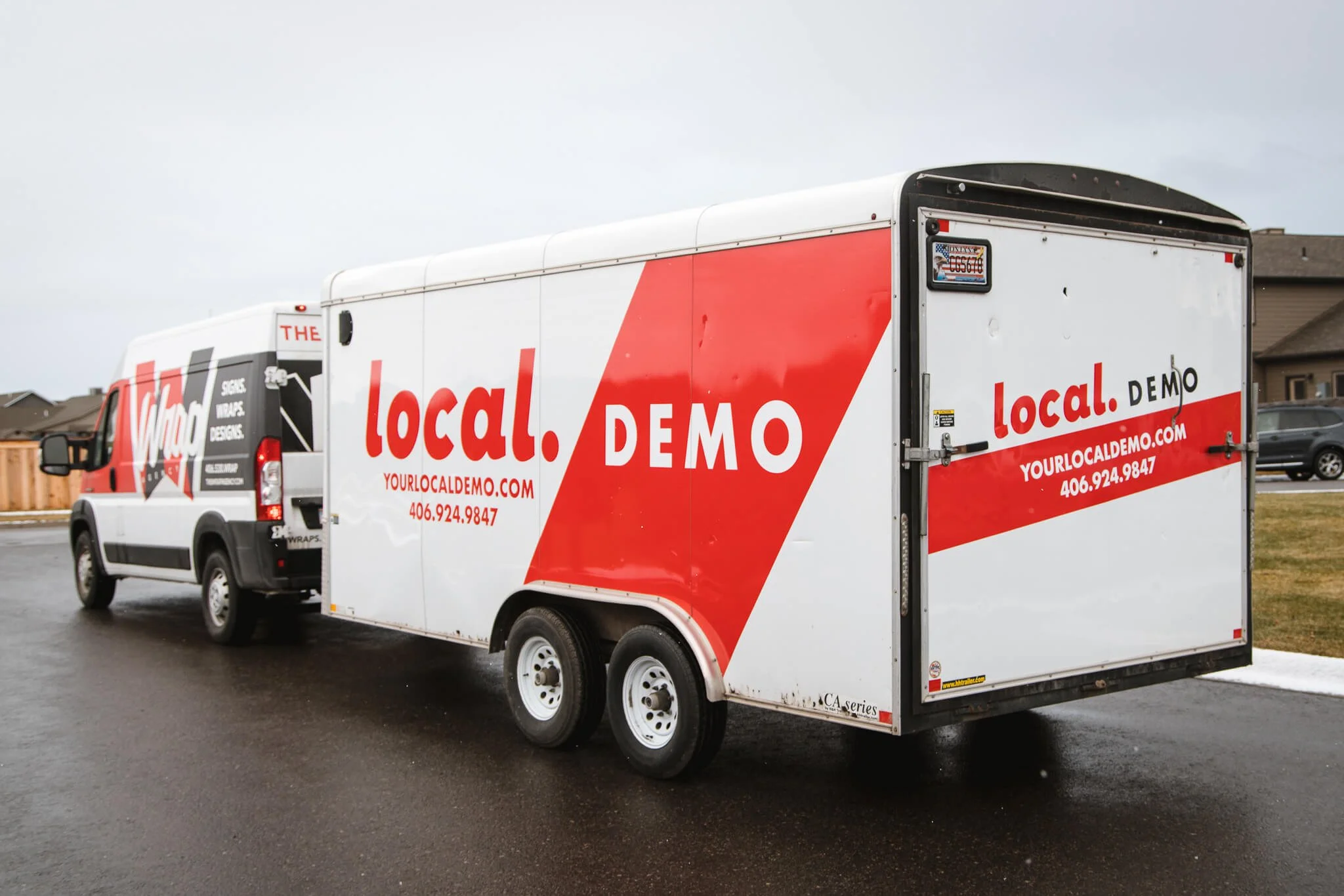 Trailer graphics for Local Demo in Bozeman, Montana, with clean, bold red and white branding, contact info, and a modern diagonal design.