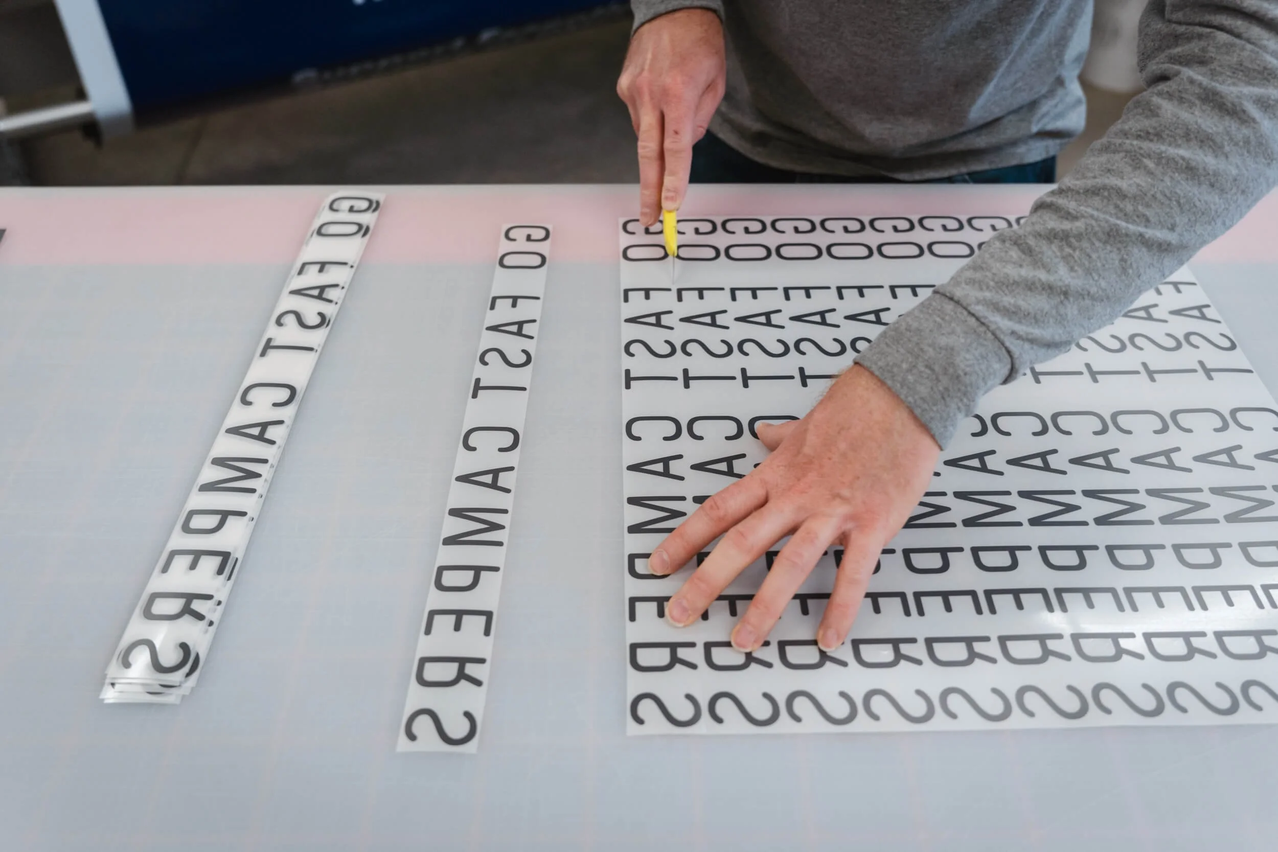 Vinyl decal production at The Wrap Agency, where custom designs are cut with precision.