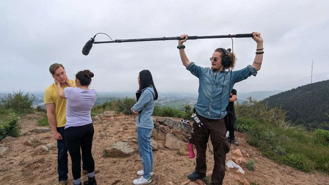 Manning the boom on the set of Engage (2024)