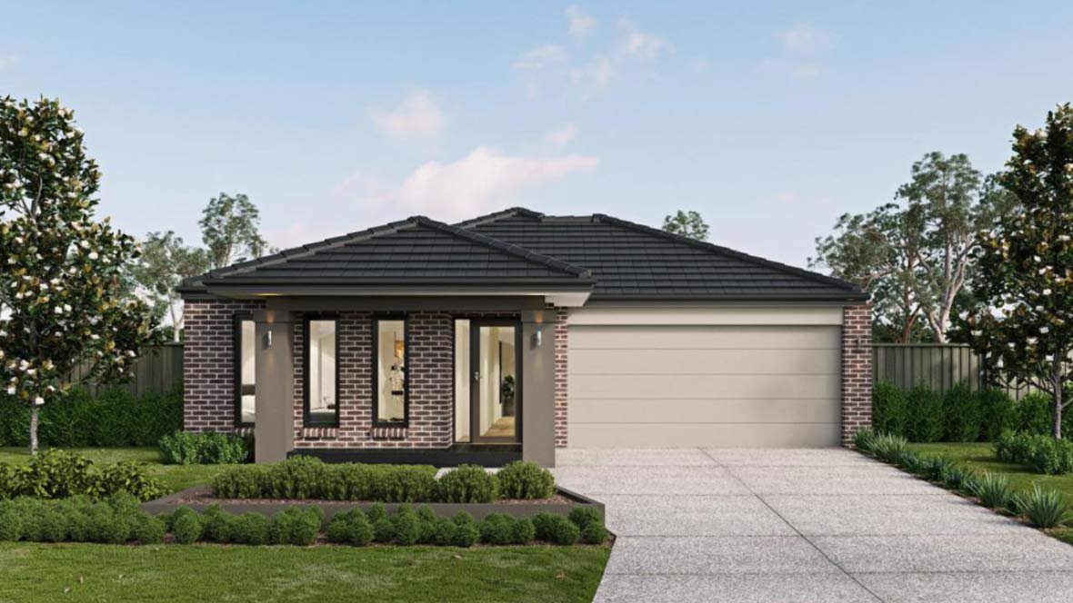 Front view of a modern single-story house with brick and beige siding, a dark tiled roof, and a concrete driveway, surrounded by green lawn and trees. Within the Elloura Estate, Nagambie. House is built by JG King Homes.