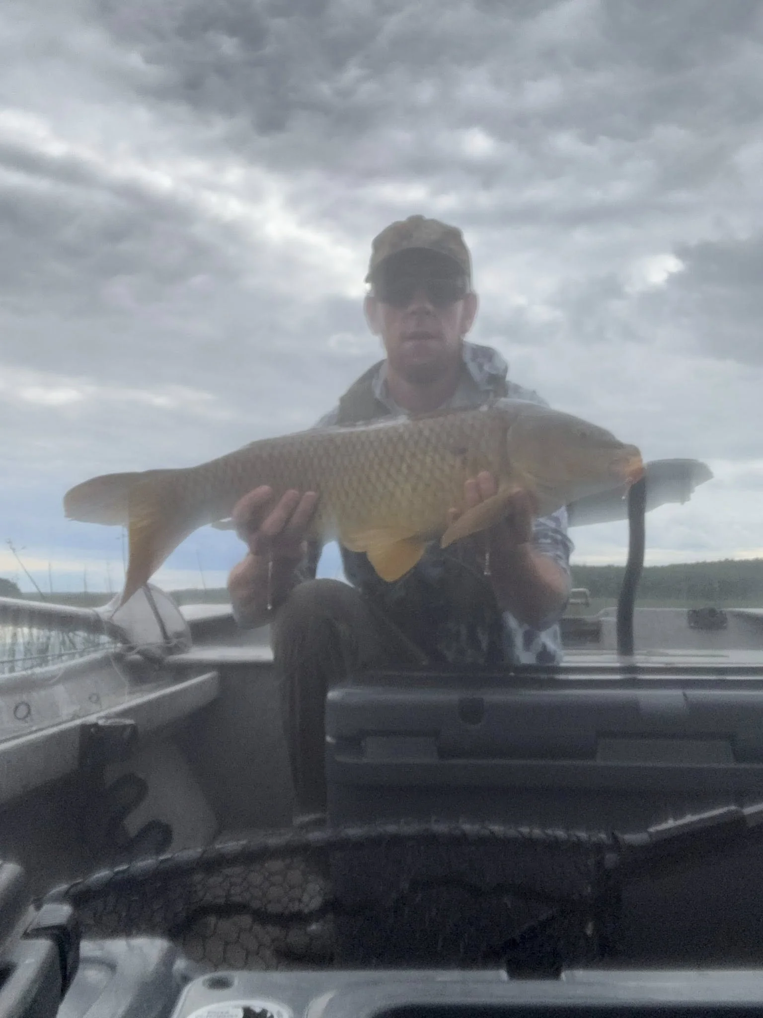 Maine Fishing Guide Brandon Bichrest with a Carp caught on a Fly in Maine 