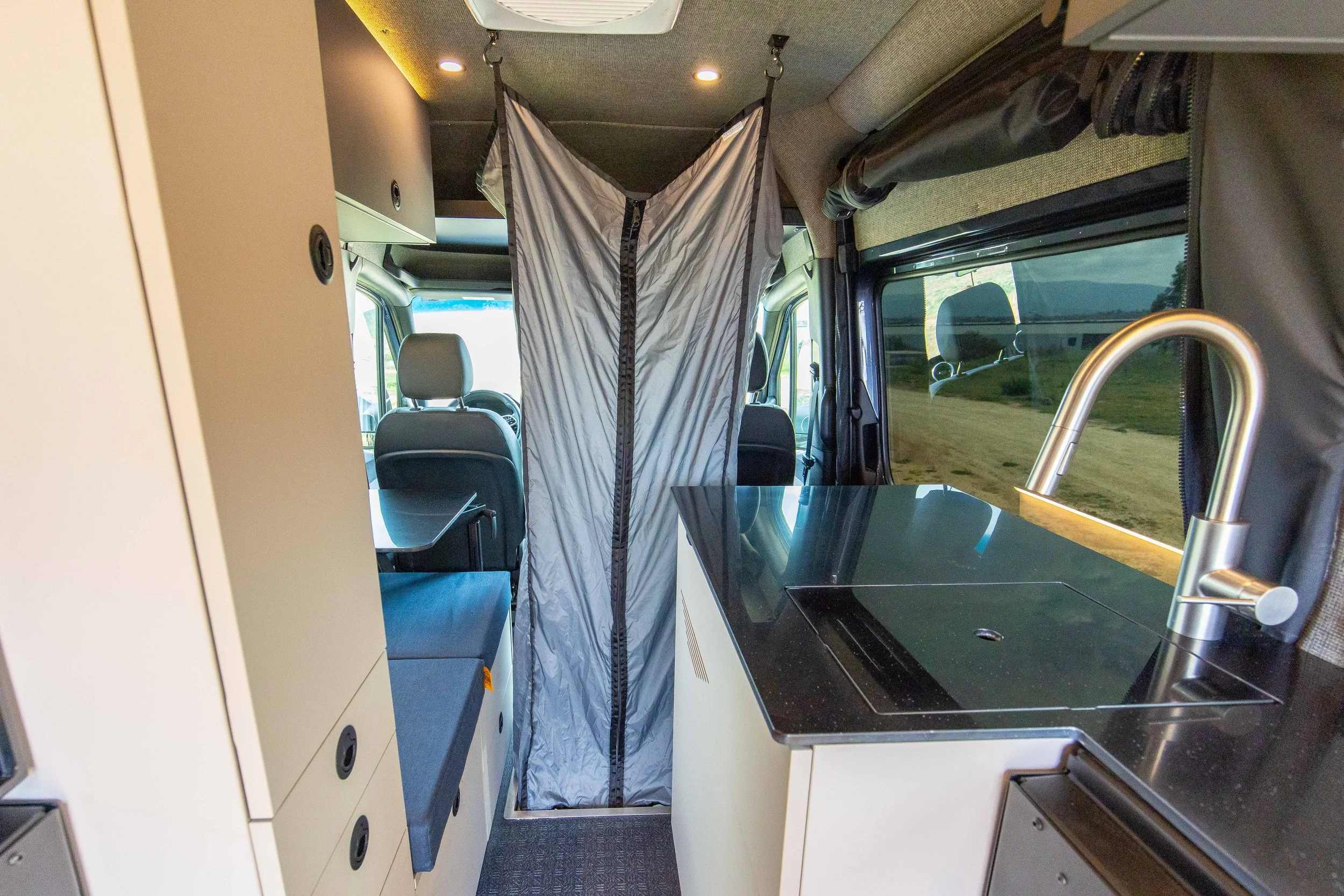 Space saving shower sprinter van 
