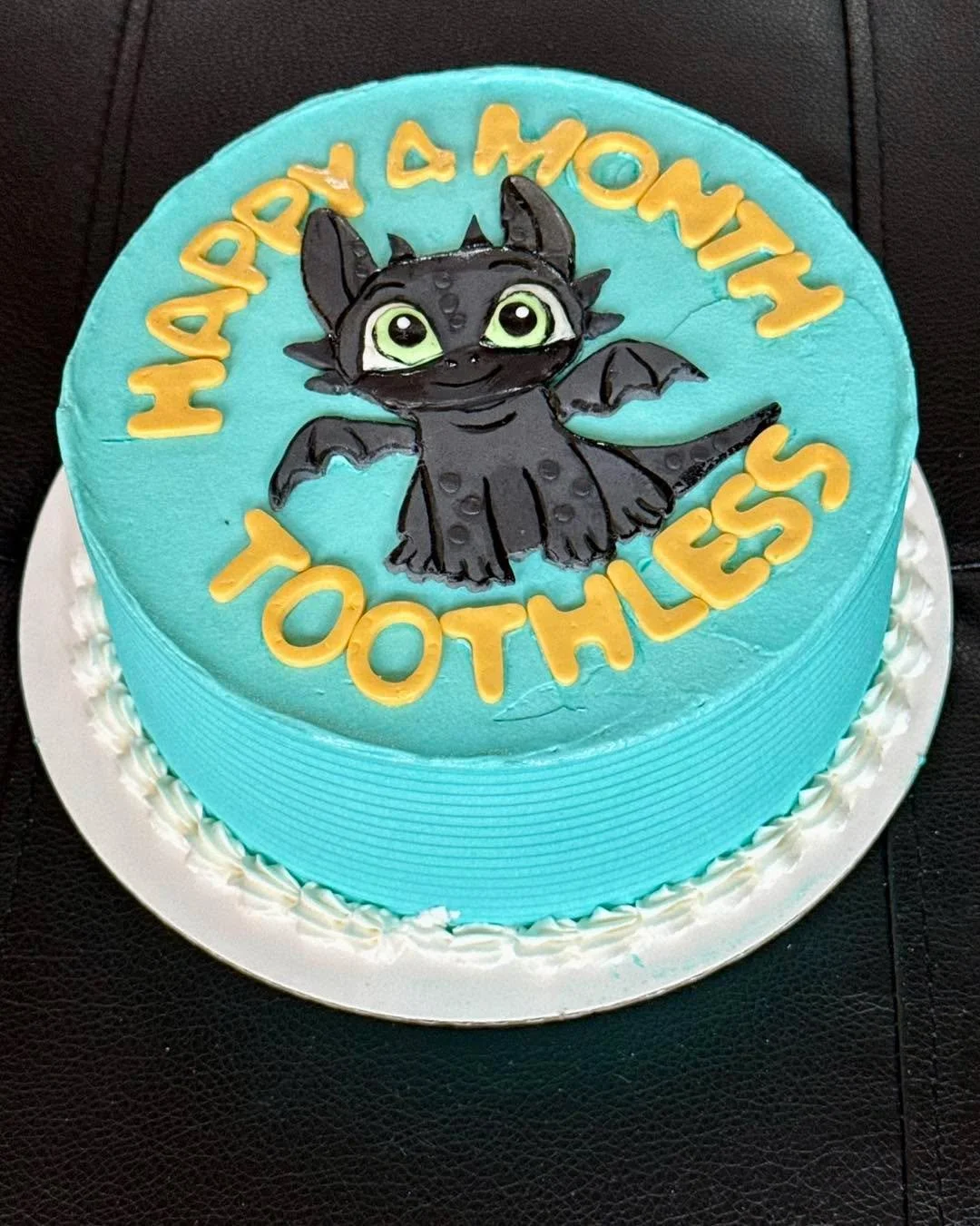 🐉 A very happy 4 month 🐣celebration cake! 🐉 Not toothless for much longer 😂 (German Chocolate Cake)

#toothless #toothlessthedragon
#customcakes #baking #cakedecorating #explorepage #birthdaycake #cakeshop #smallbusinessowner #igcakes #bakersofsj