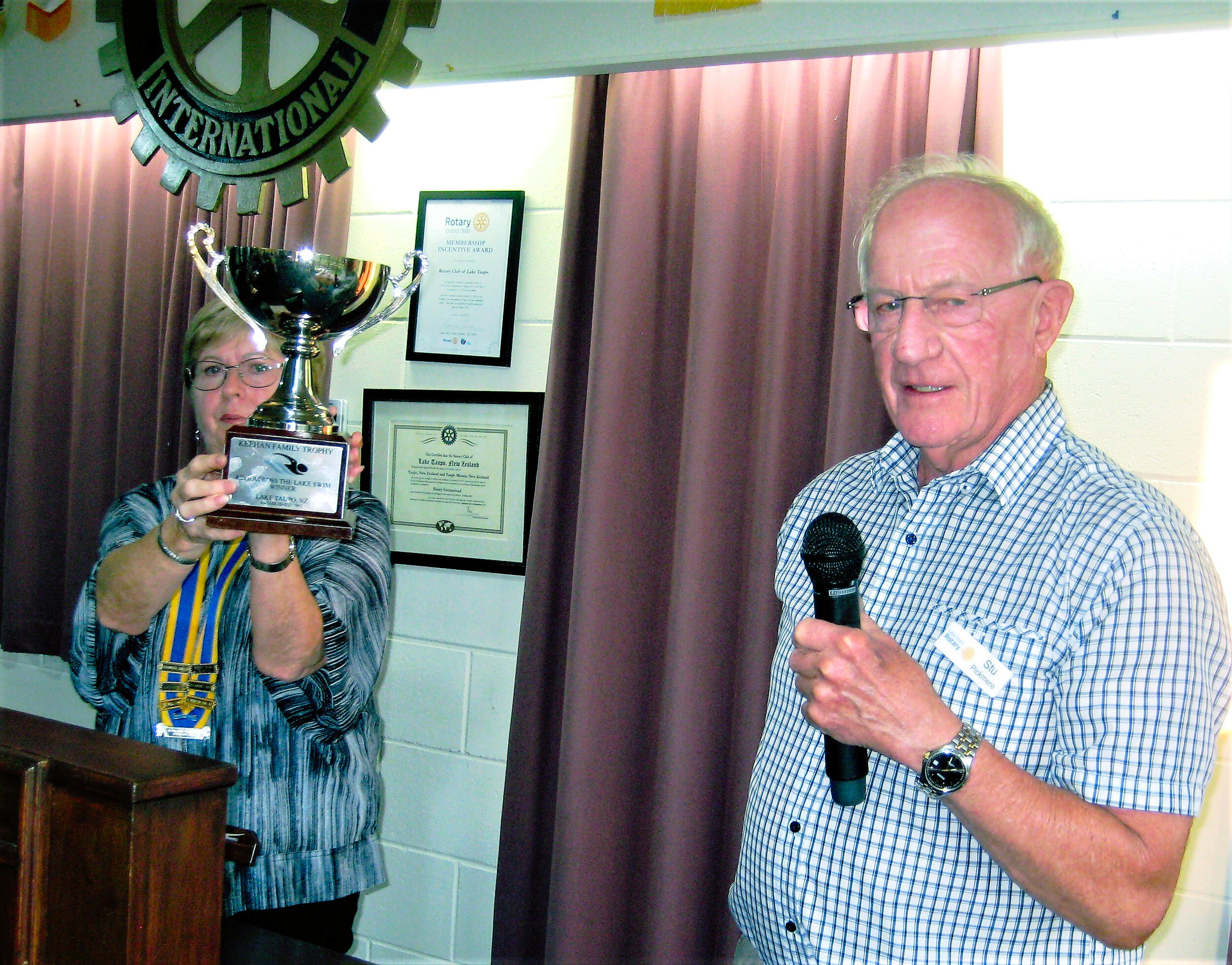 20. President Mary Legg with Stu Pickmere and the Across the Lake trophy 8 March 2021.JPG