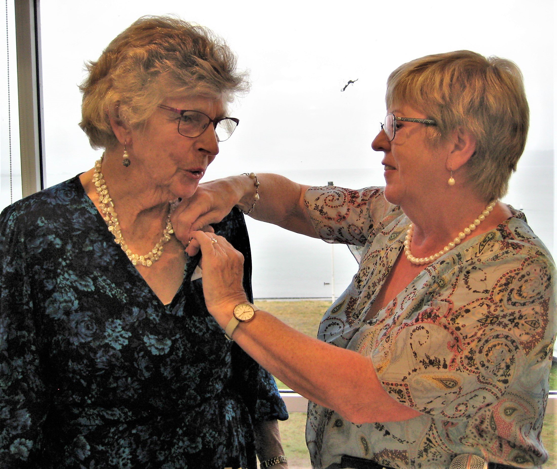 3. Past President Mary Legg presenting Mary Lockwood with a Second Sapphire to her Paul Harris Badge.JPG