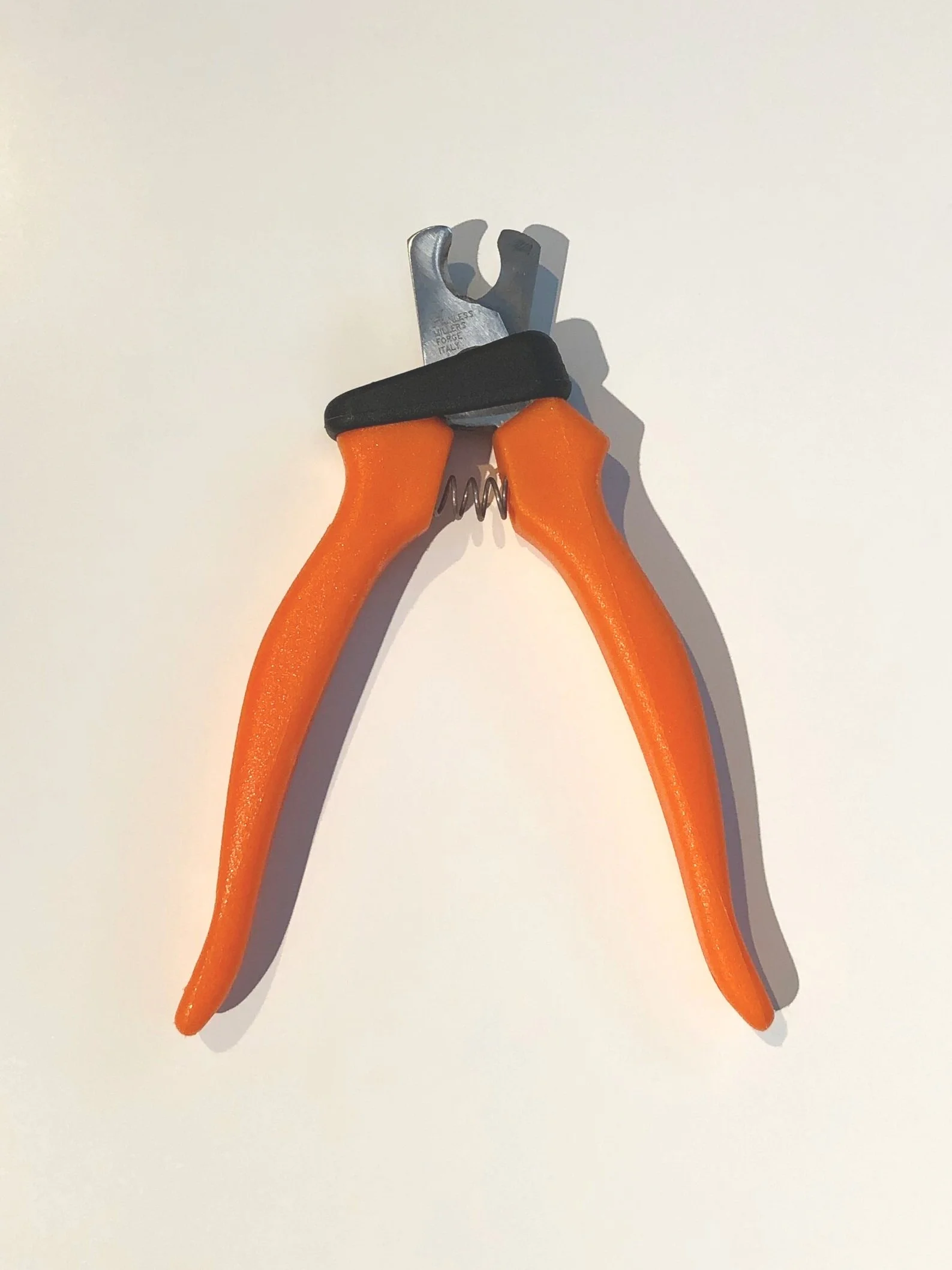 The  Millers Forge Nail Clipper  with the guard open and the handle sprung open