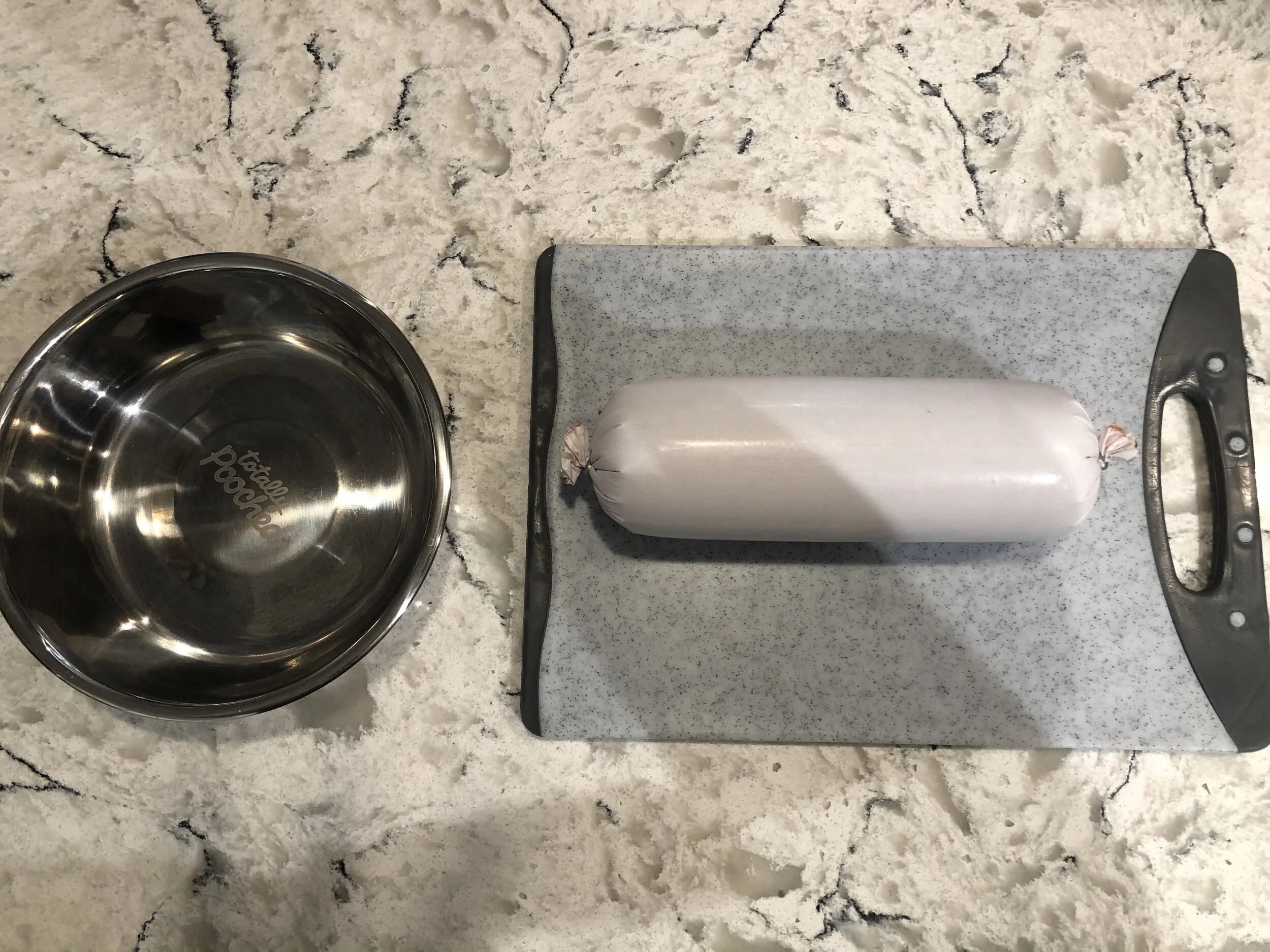 A tube of raw chicken, bone & vegetable from  CRUDO by Surrey Meat Packers