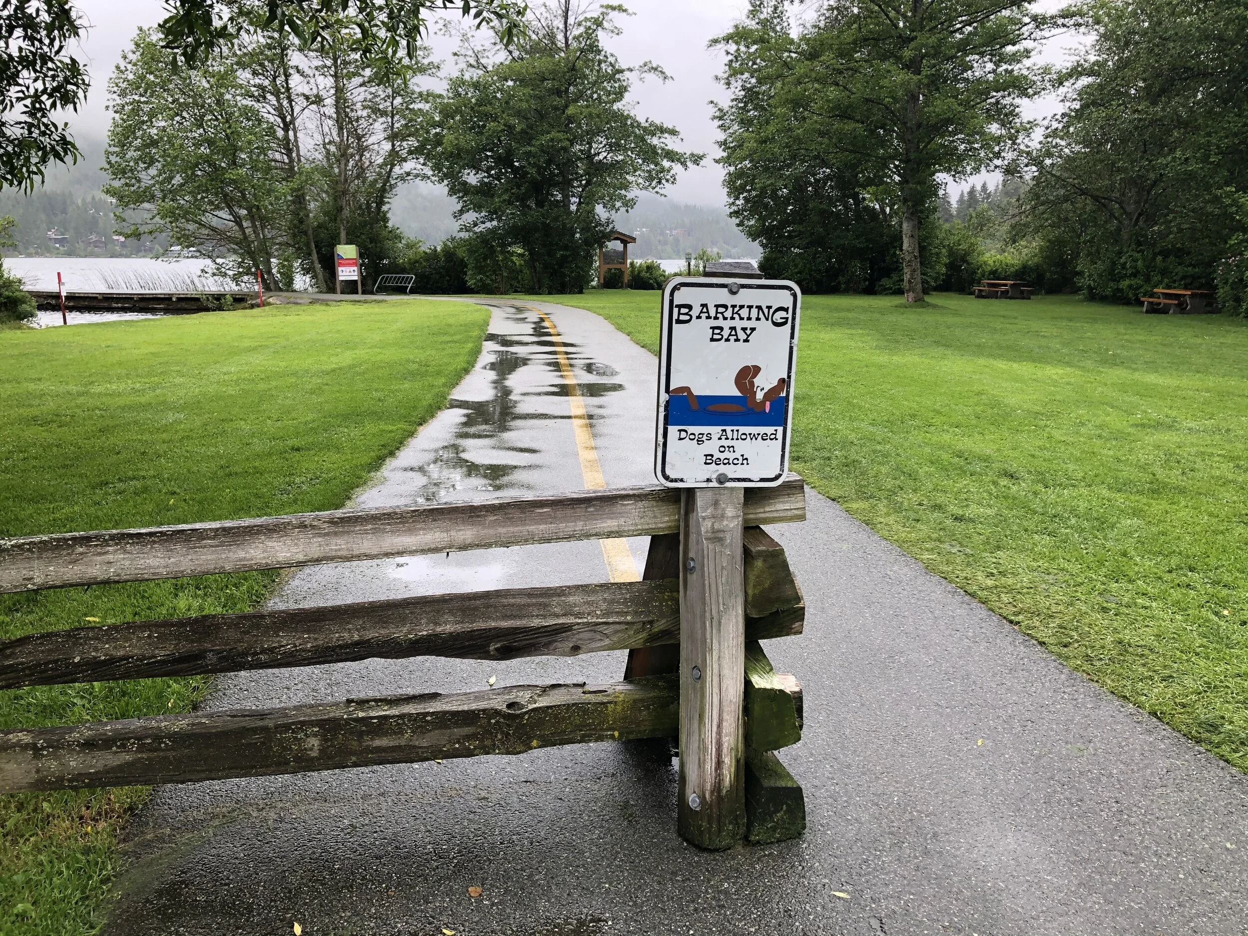 The opened fence at Barking Bay with the dock on the left and access to the water straight in front at Rainbow Park
