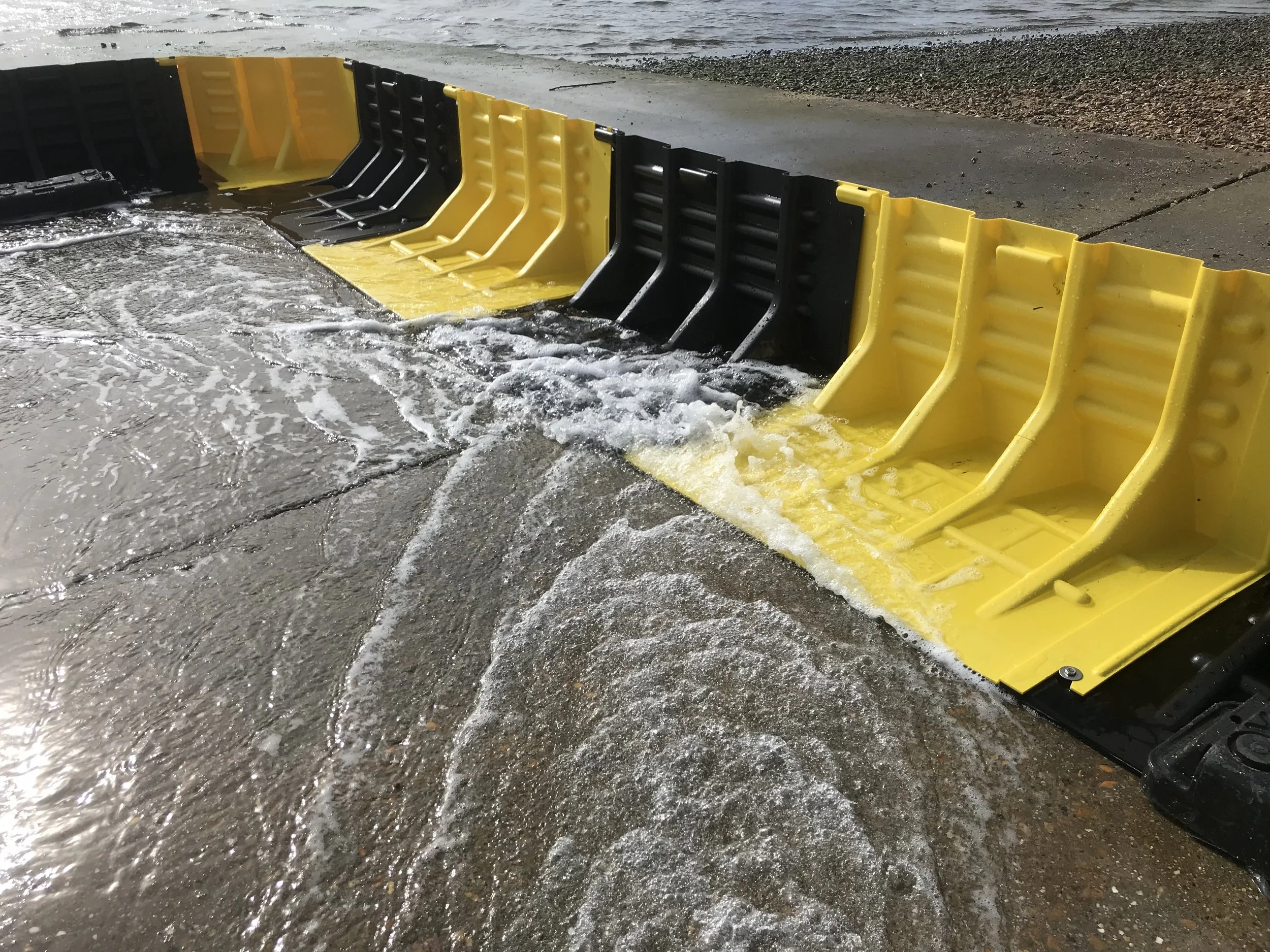 FloodFence Fluvial Innovations  Water diverter Flood Barrier Philippines
