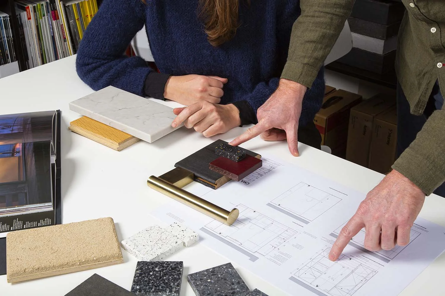 Studio CMA reviewing interior materials, drawings and finishes for a London home renovation.