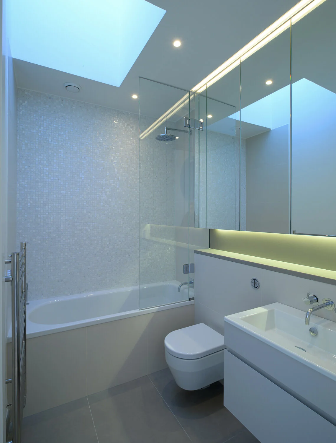 Bathroom with rooflight, upgraded fabric and ventilation as part of early retrofit measures in a Victorian home.