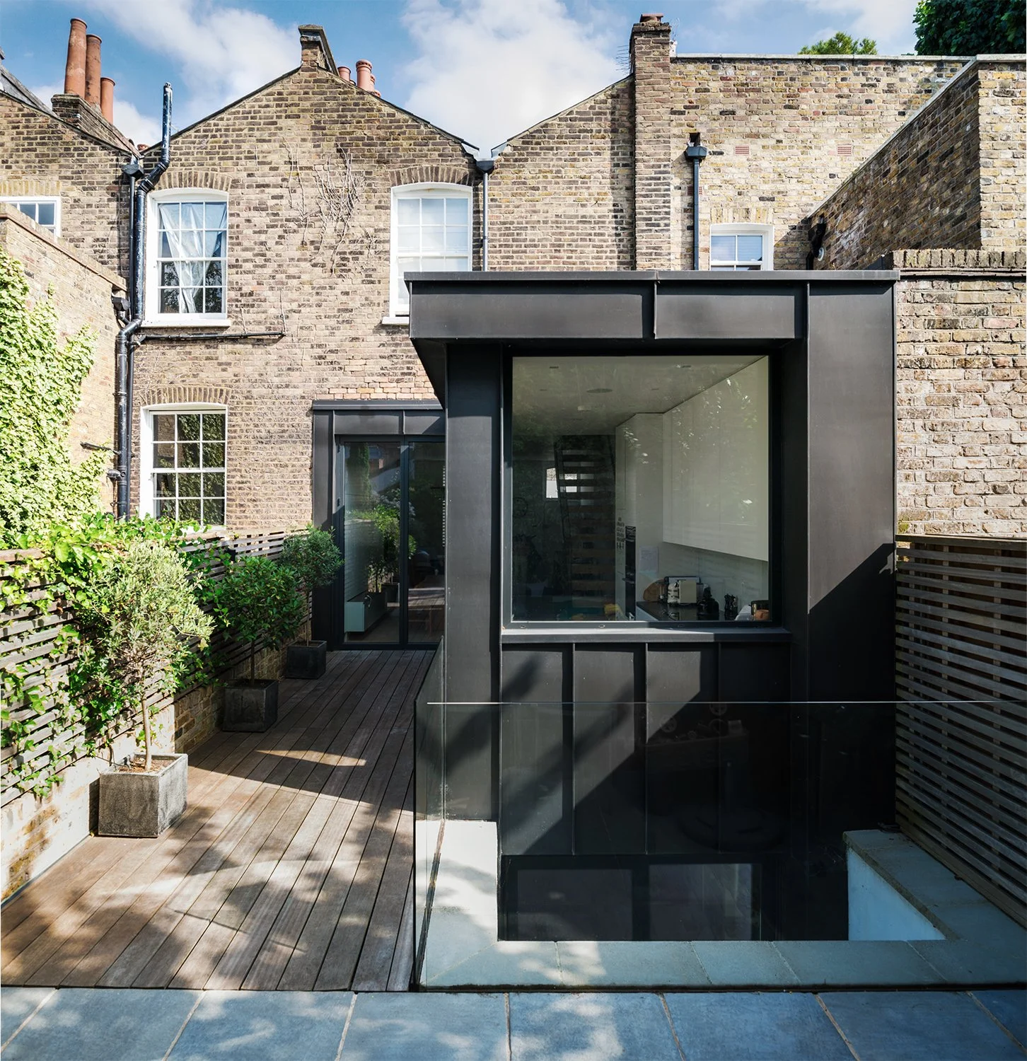 Rear and basement extension to a Victorian terrace in Islington, designed to sit quietly within a conservation area.