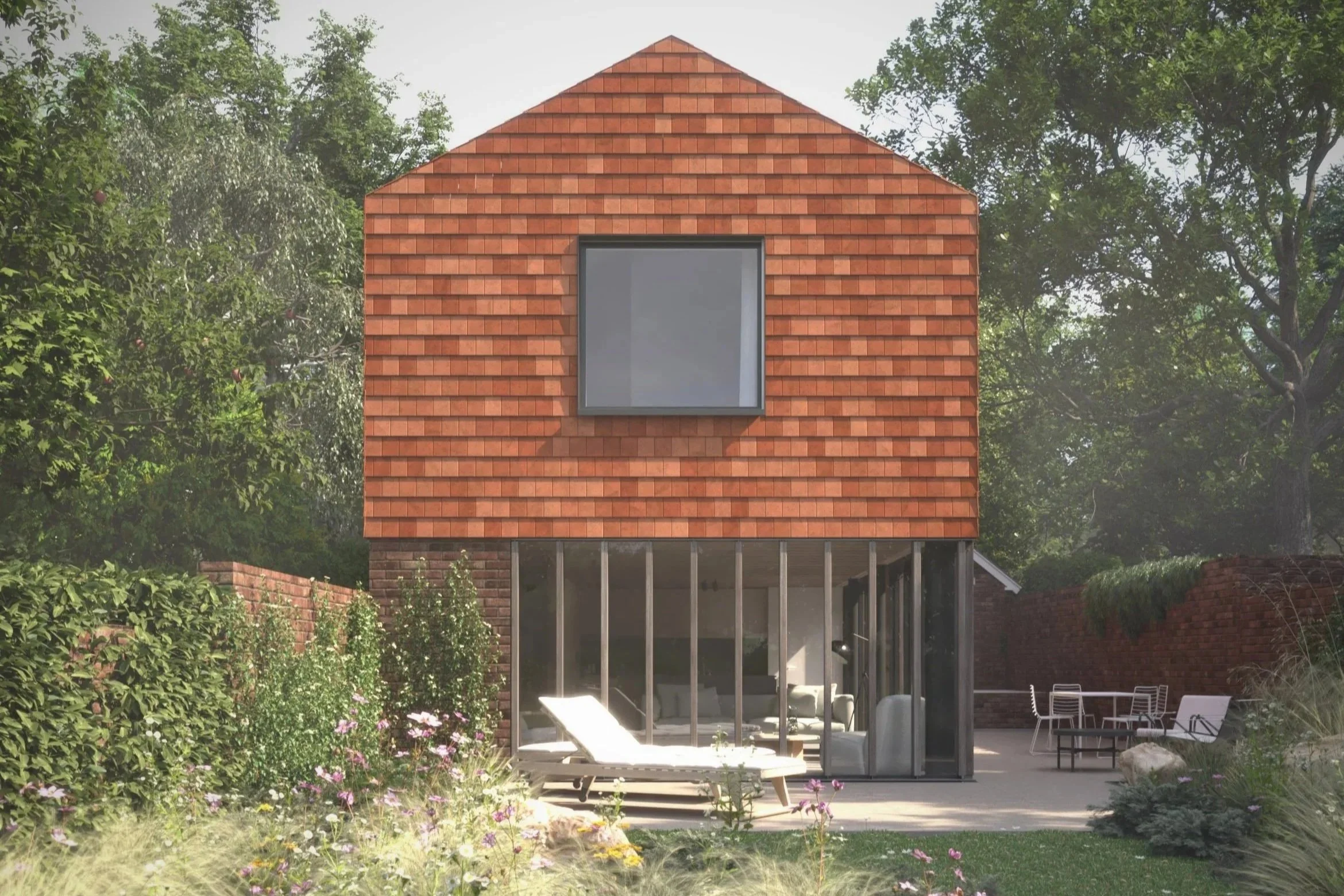 New-build Passivhaus home in a Kent village, clad in traditional clay peg tiles with a wildflower garden in the foreground.