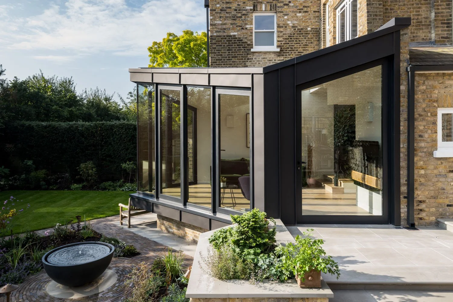 Cantilevered garden room at Culverden Road showing complex architectural design and construction coordination