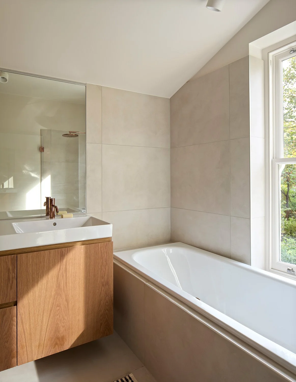 Warm finished interior of a renovated London period home designed for comfort and long-term use