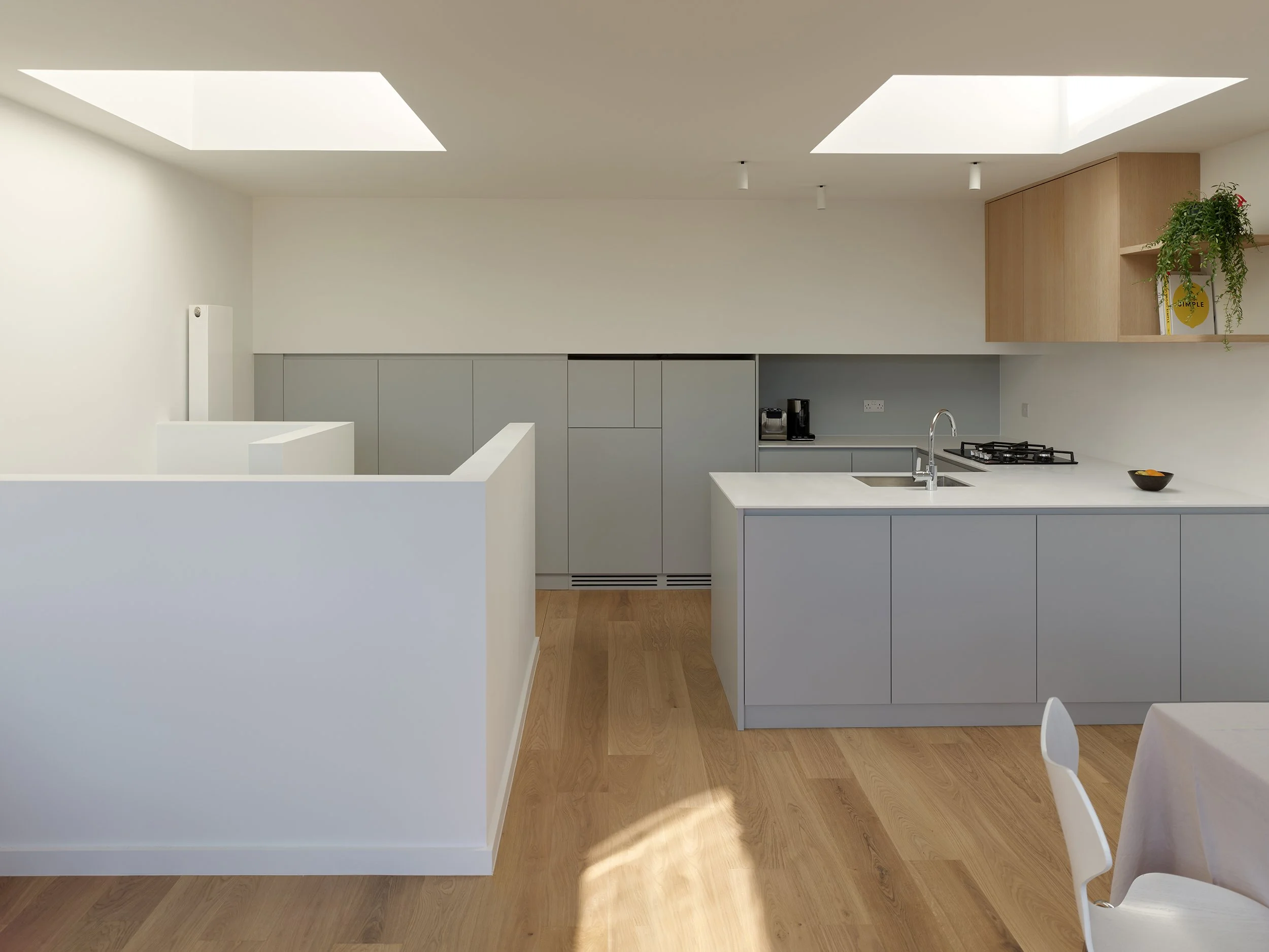 Kitchen and dining space in a self-contained flat created within a roof extension in London Fields Hackney