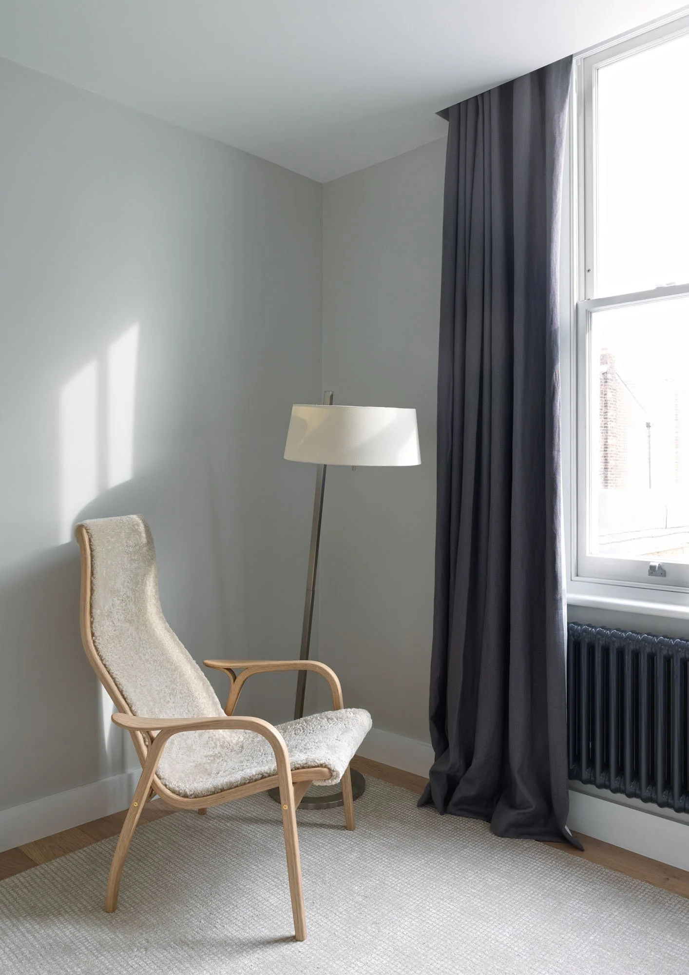 Loft bedroom in a Victorian terrace showing how ceiling heights and section were carefully recalibrated.