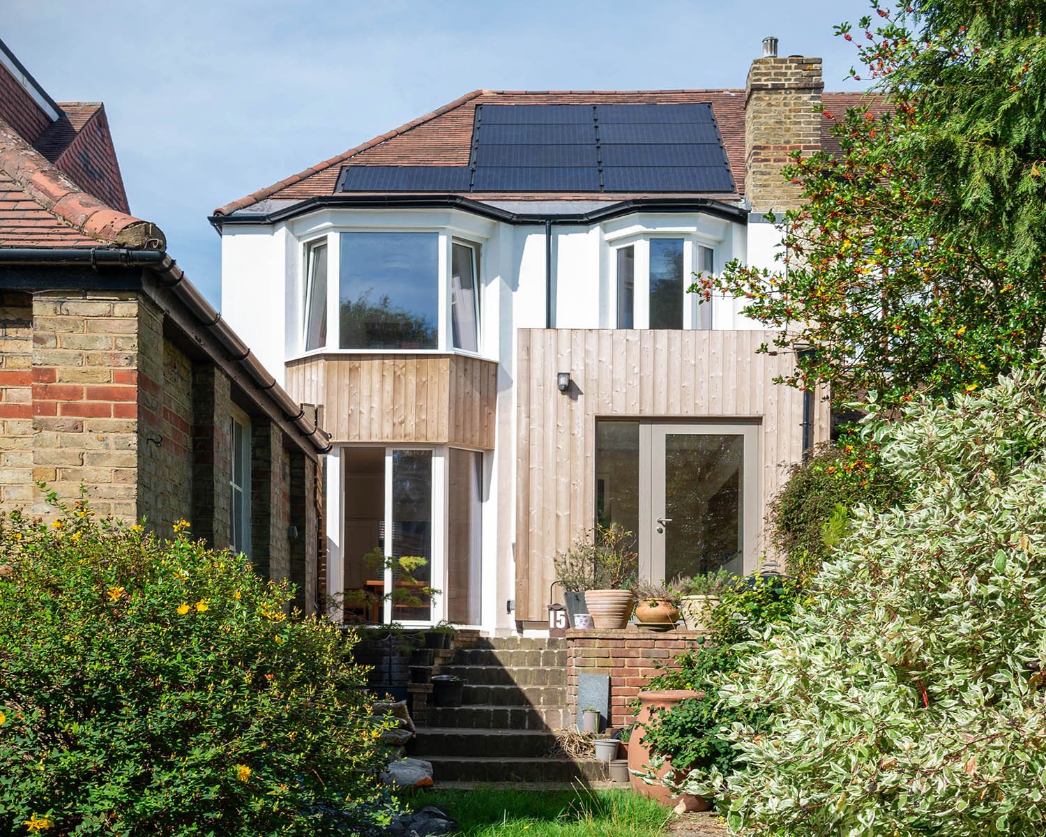Rear view of an interwar semi-detached house in North London after whole-house retrofit upgrades