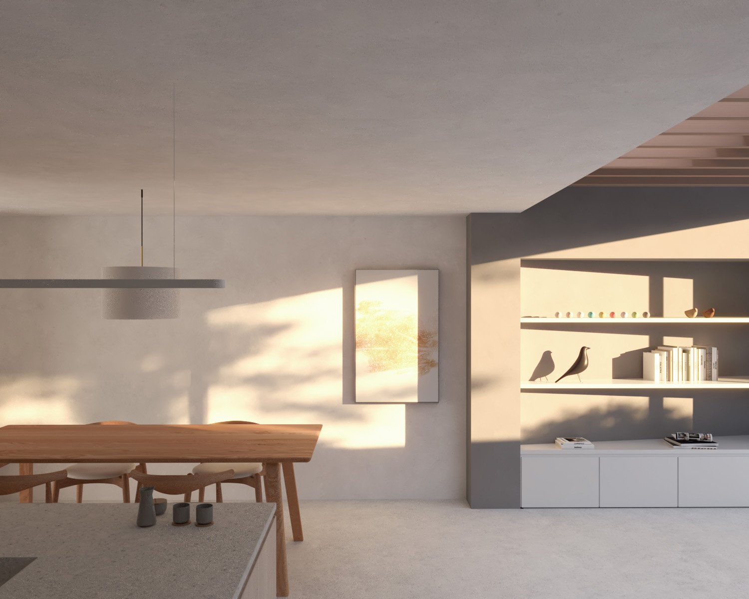 Dining area in the Walthamstow extension, with built-in shelving and the kitchen beyond.