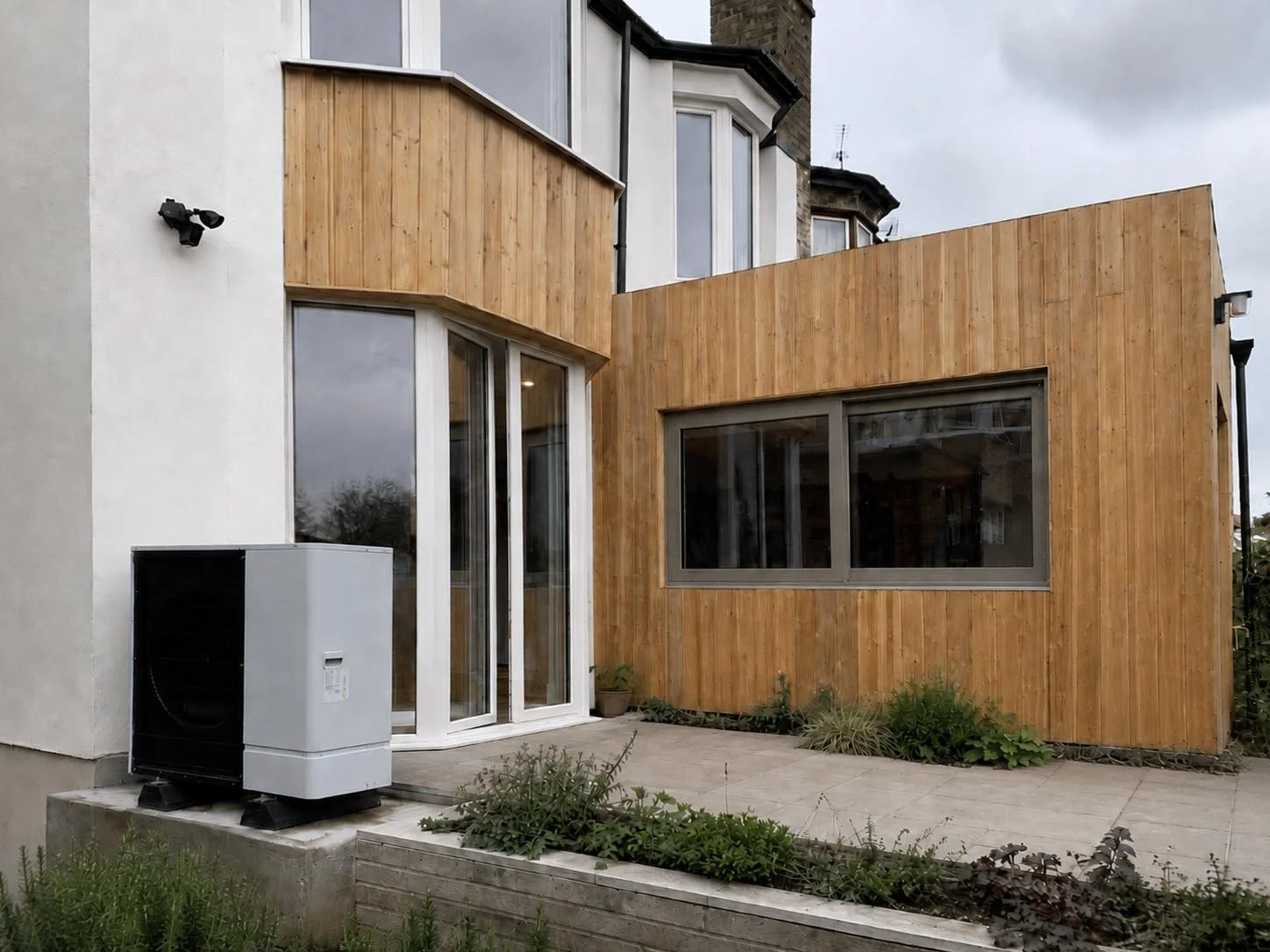 Air source heat pump installed at the rear of The Orchard, an interwar semi-detached house retrofit in North London