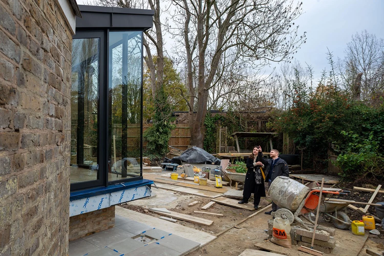 Studio CMA architects inspecting construction works during a residential extension site visit