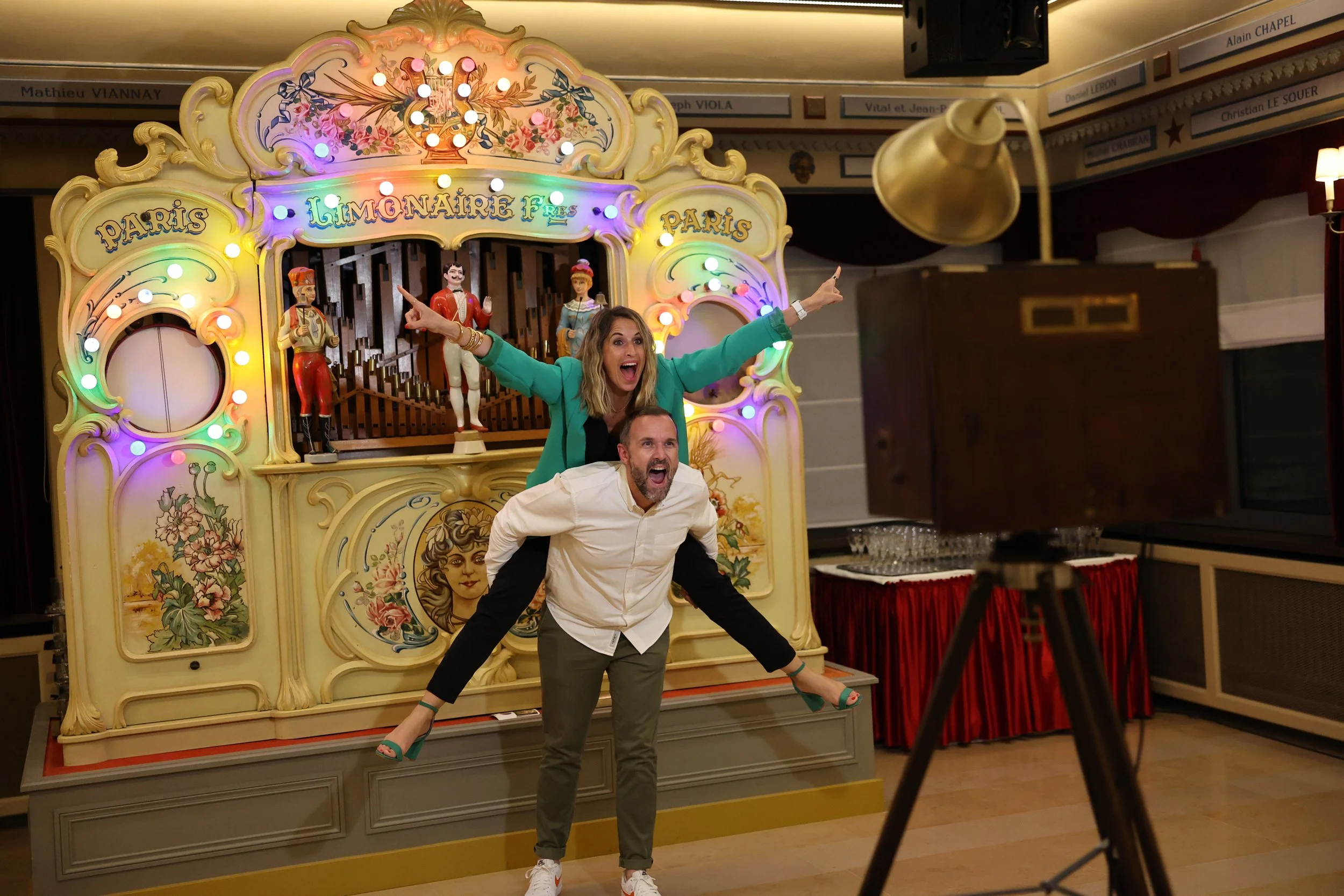 Two work colleagues are having fun at an event in Lyon