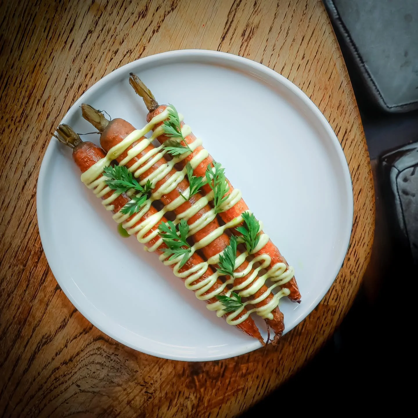 There's something very special about our carrot dishes at Brix....
 
But how do we make them taste so delicious?

Like many dishes at Brix, it's all about their preparation.

Locally sourced carrots -  smoked over the coals then glazed with carrot ju