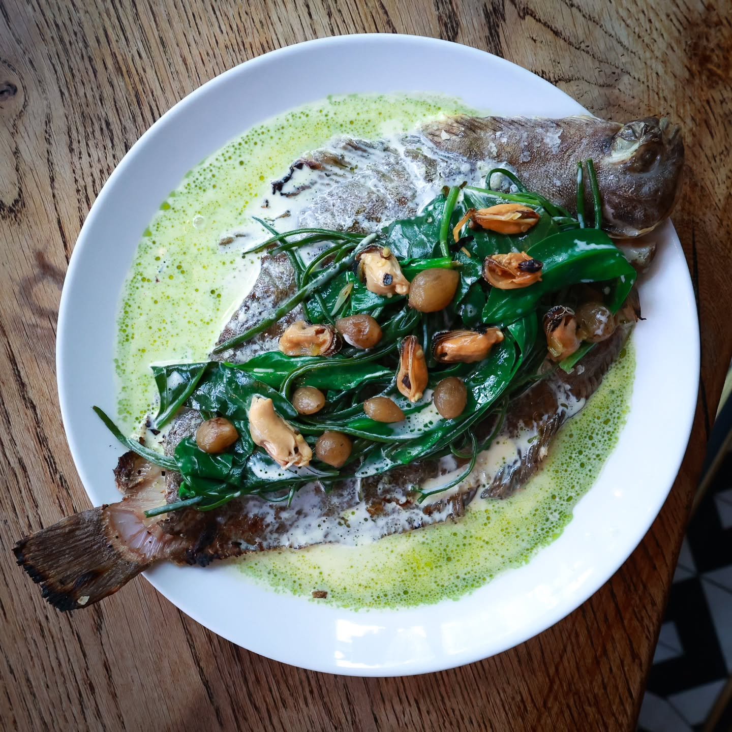 Lemon sole, mussel cream, pickled onion, sea spaghetti.

@georgewoodchef's new fish dish - available next Wednesday from 6pm.

To book a table, visit our website, link in bio
.
.
.
#fishdishes 
#livefirecooking 
#norwich