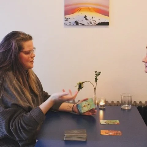 One evening, @soulful_sally came in for dinner with a friend and settled into the window seat. As she gathered her things to leave, her bag tipped and a deck of tarot cards spilled across the table &mdash; catching the light and our attention. One cu