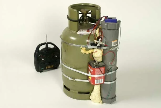 UNTITLED (2 REMOTE-CONTROLLED GAS BOMBS)