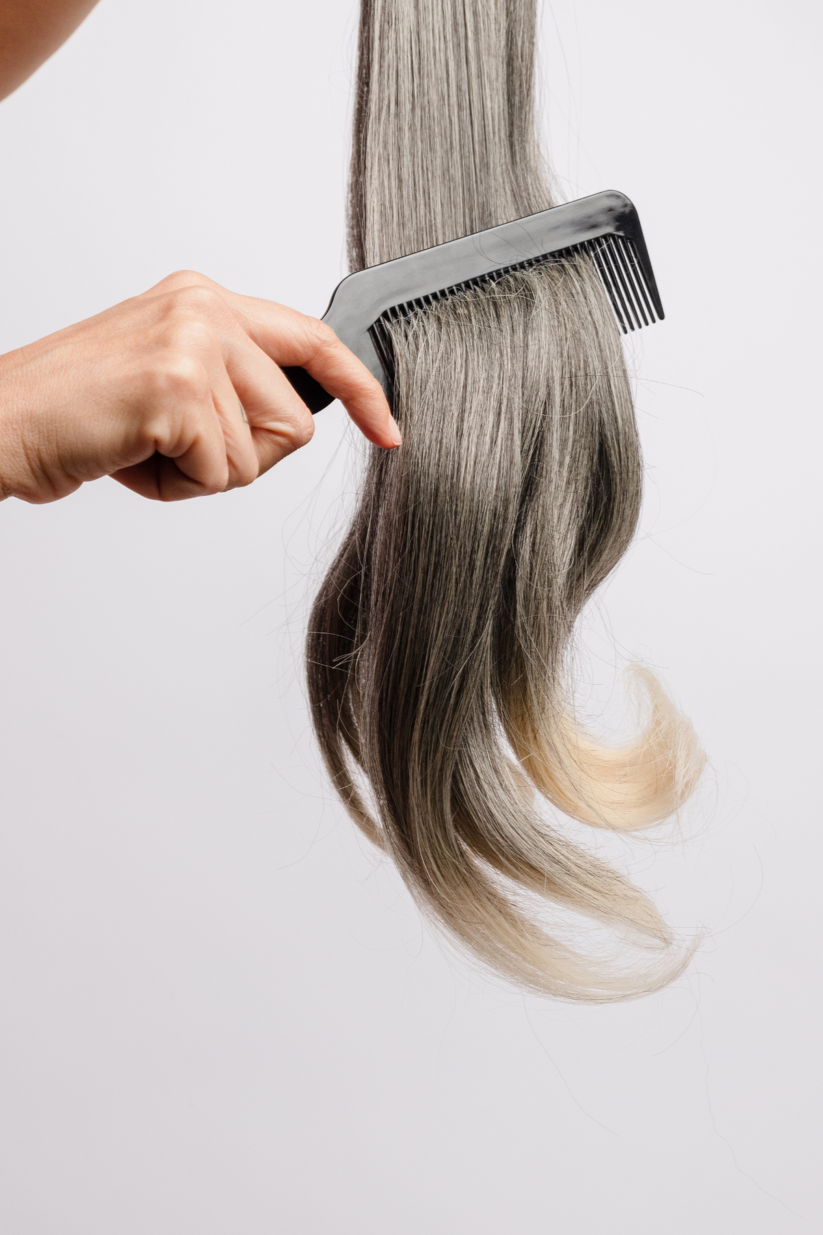 combing hair extensions