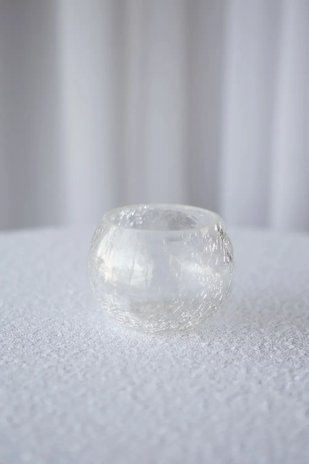 Cracked glass votive
with candle