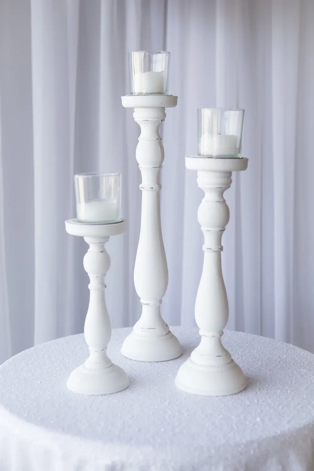 White pillar candlestick
trio