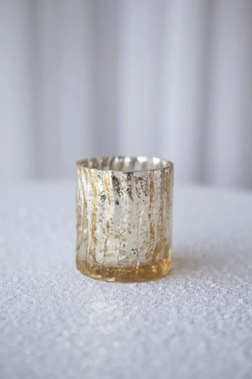 Gold mercury votive
with candle