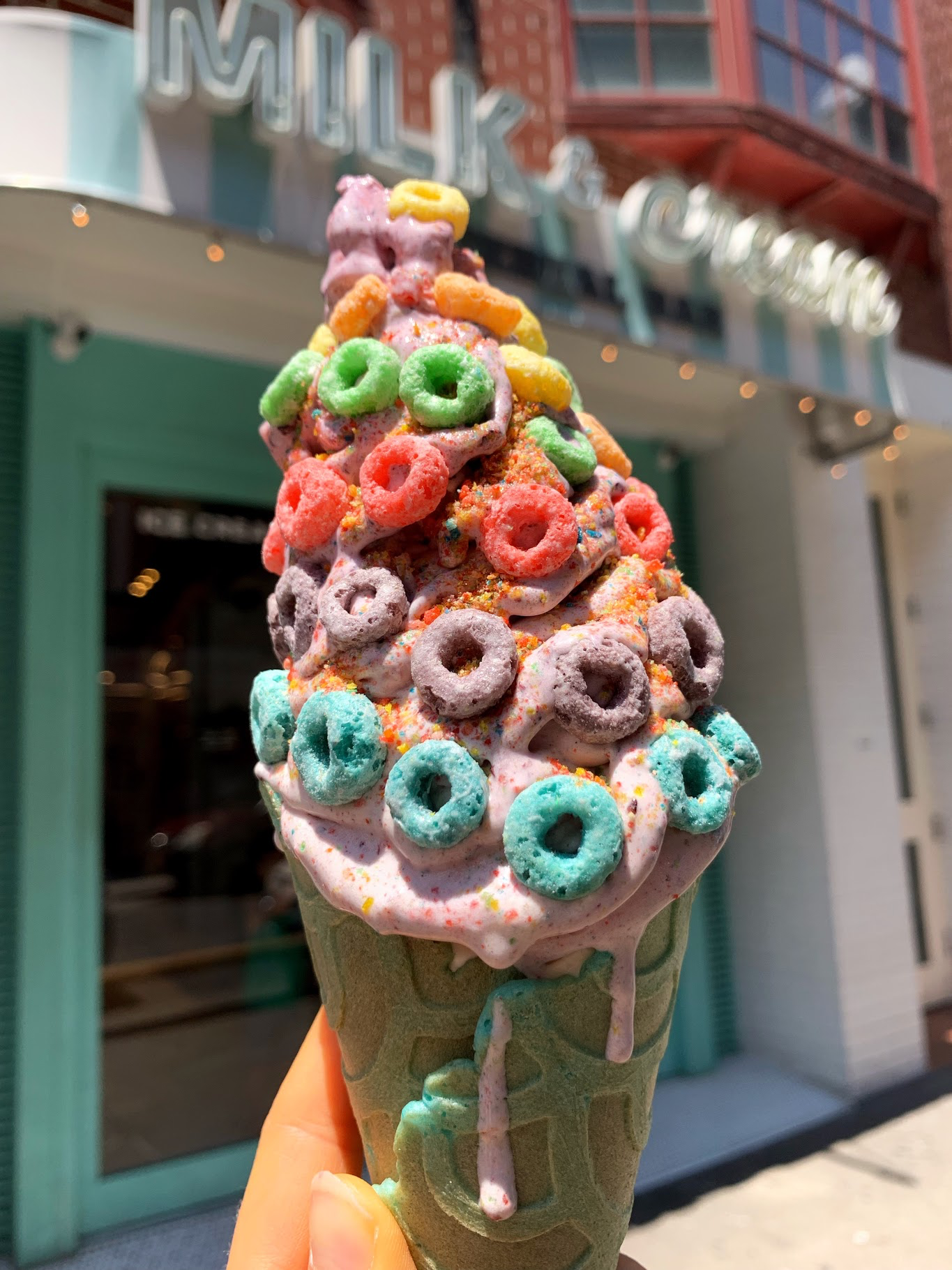 Fruity Pebbles Cone, Frosty Berry Bliss, topped with: Fruit Loops and Crushed Fruity Pebbles
