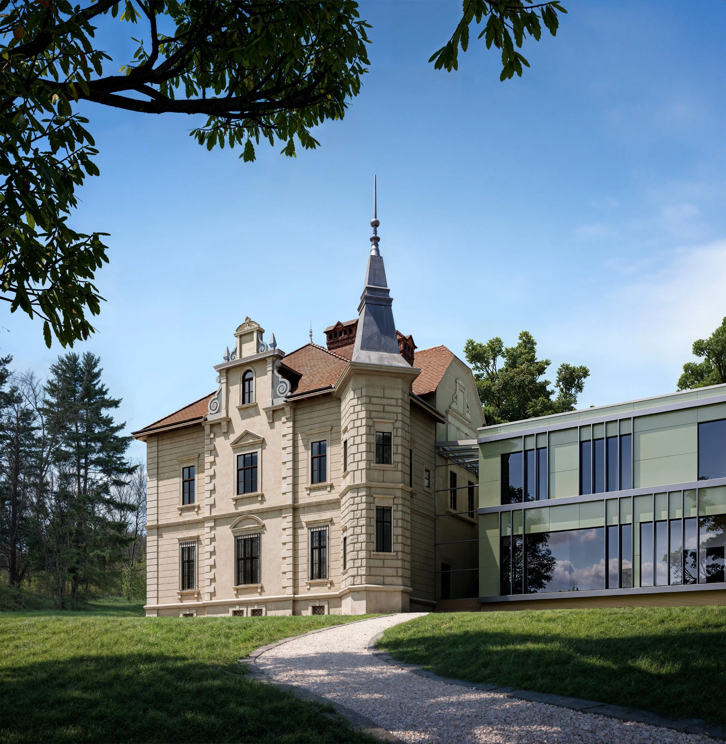 A historic stone mansion with a steeple on the roof, adjacent to a modern glass building, set in a grassy landscape with trees and a gravel pathway.
