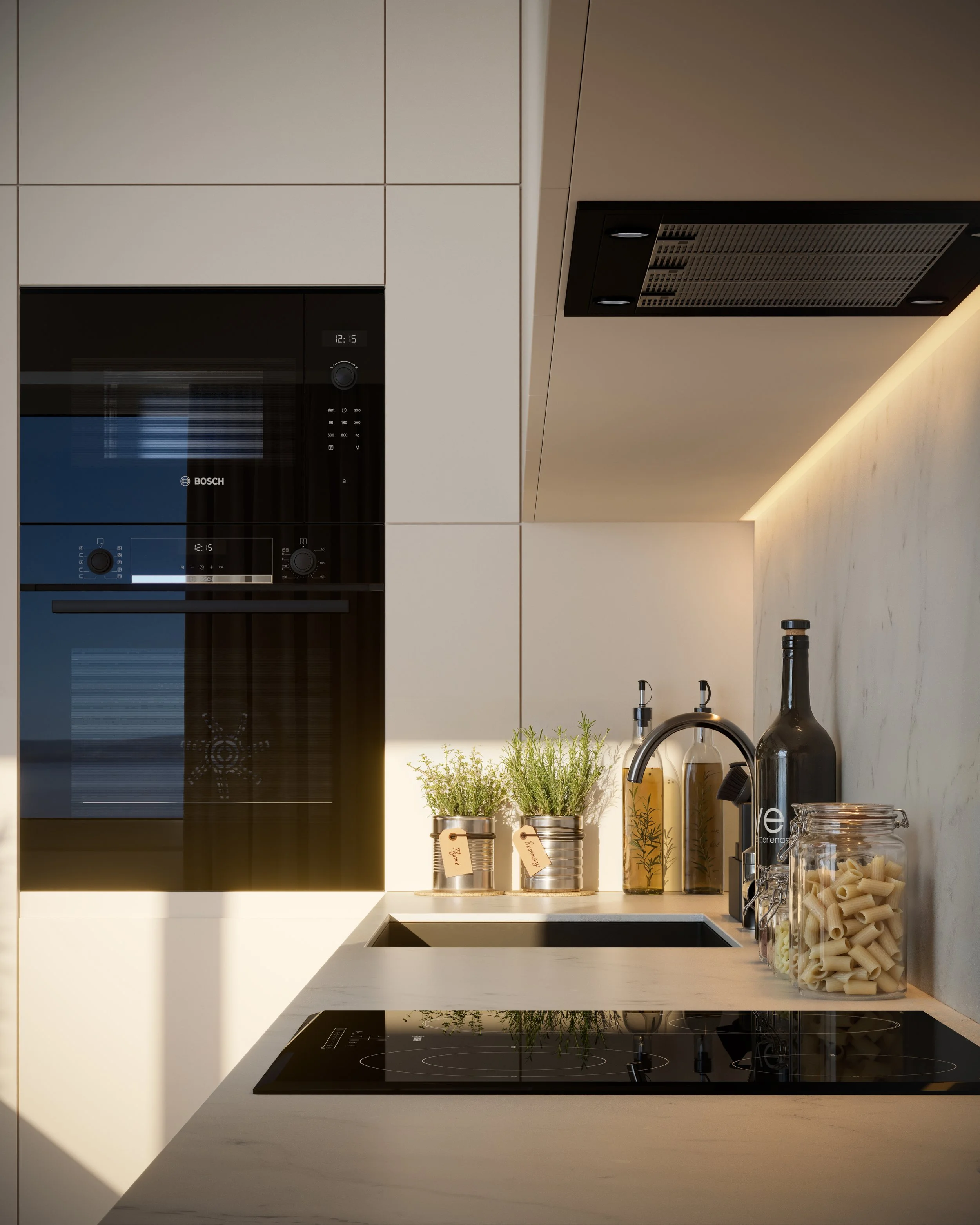 Modern kitchen countertop with a black induction cooktop, a sink with a black faucet, potted herbs, bottles of olive oil, a large bottle, and a jar of pasta.