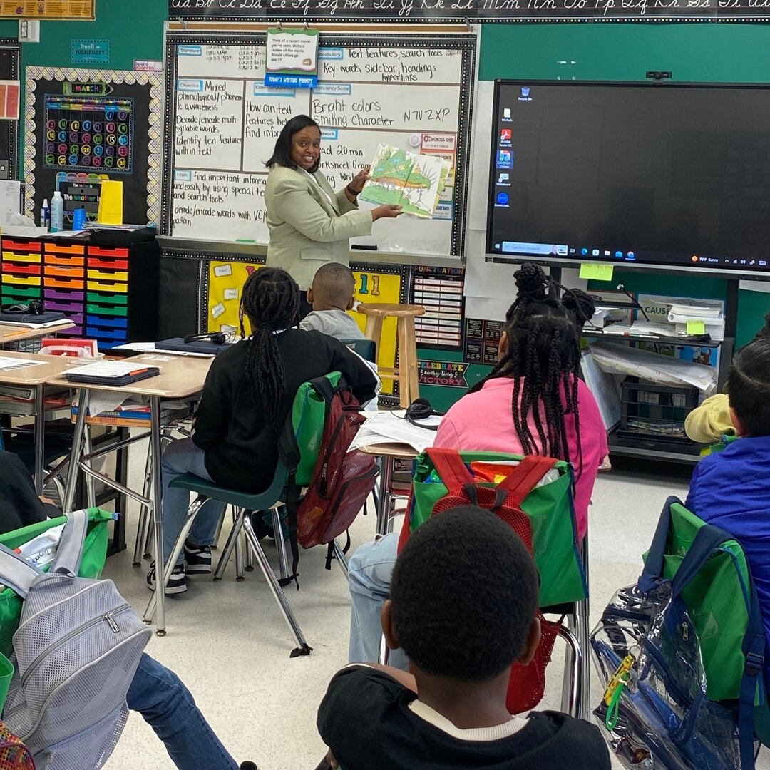 Liz Huntley visited Ms. Etheridge&rsquo;s 3rd grade class at Booker T Washington Elementary today as a guest reader for Read Across America Week. She read &ldquo;Oh the Places You&rsquo;ll Go&rdquo; by Dr. Seuss and discussed resilience and persevera