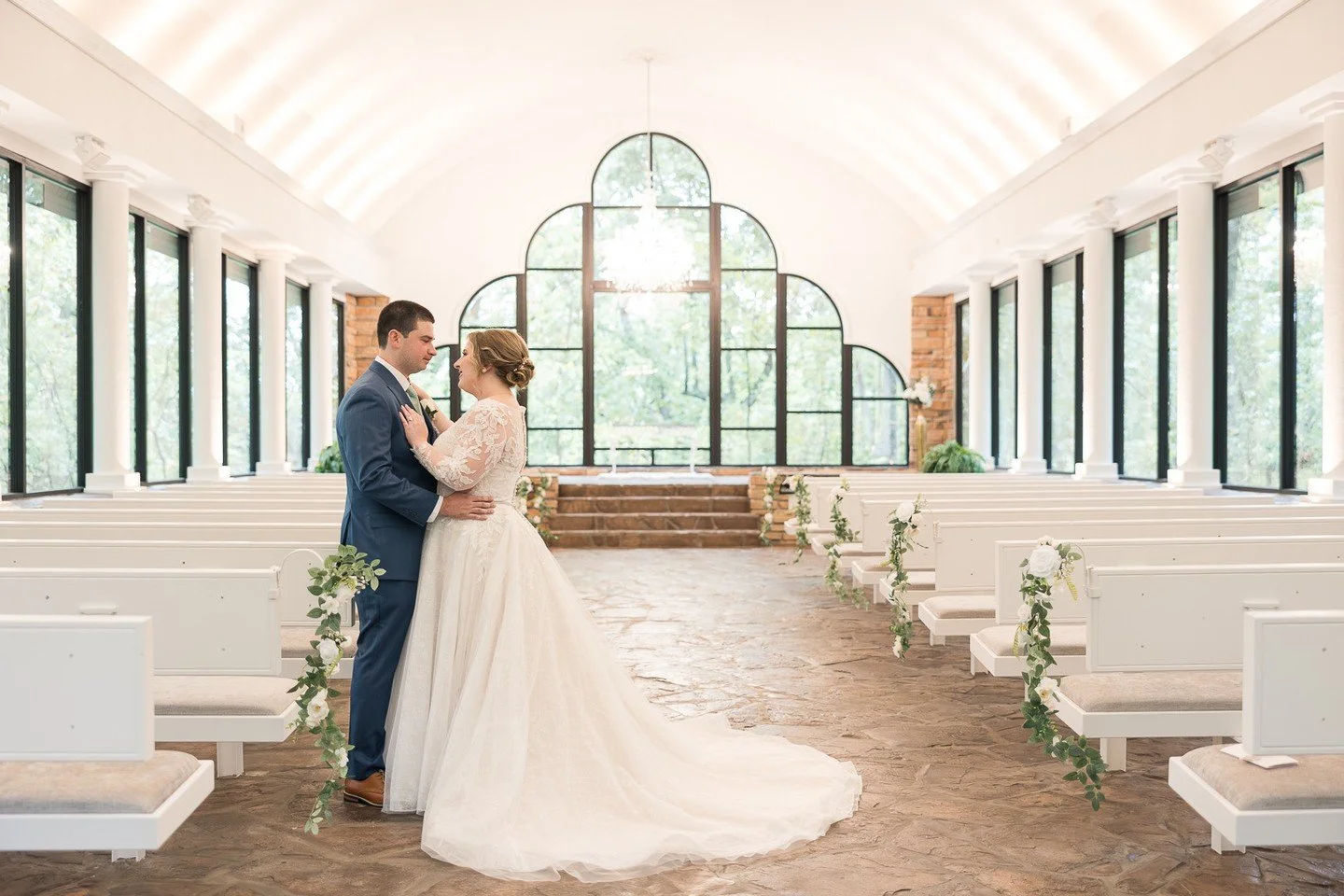 Sometimes the simplest setups are the most stunning.
The natural surroundings, soft light, and clean lines of the chapel create such a peaceful backdrop on their own.
Whether you add florals or keep it minimal - this space truly lets the moment
