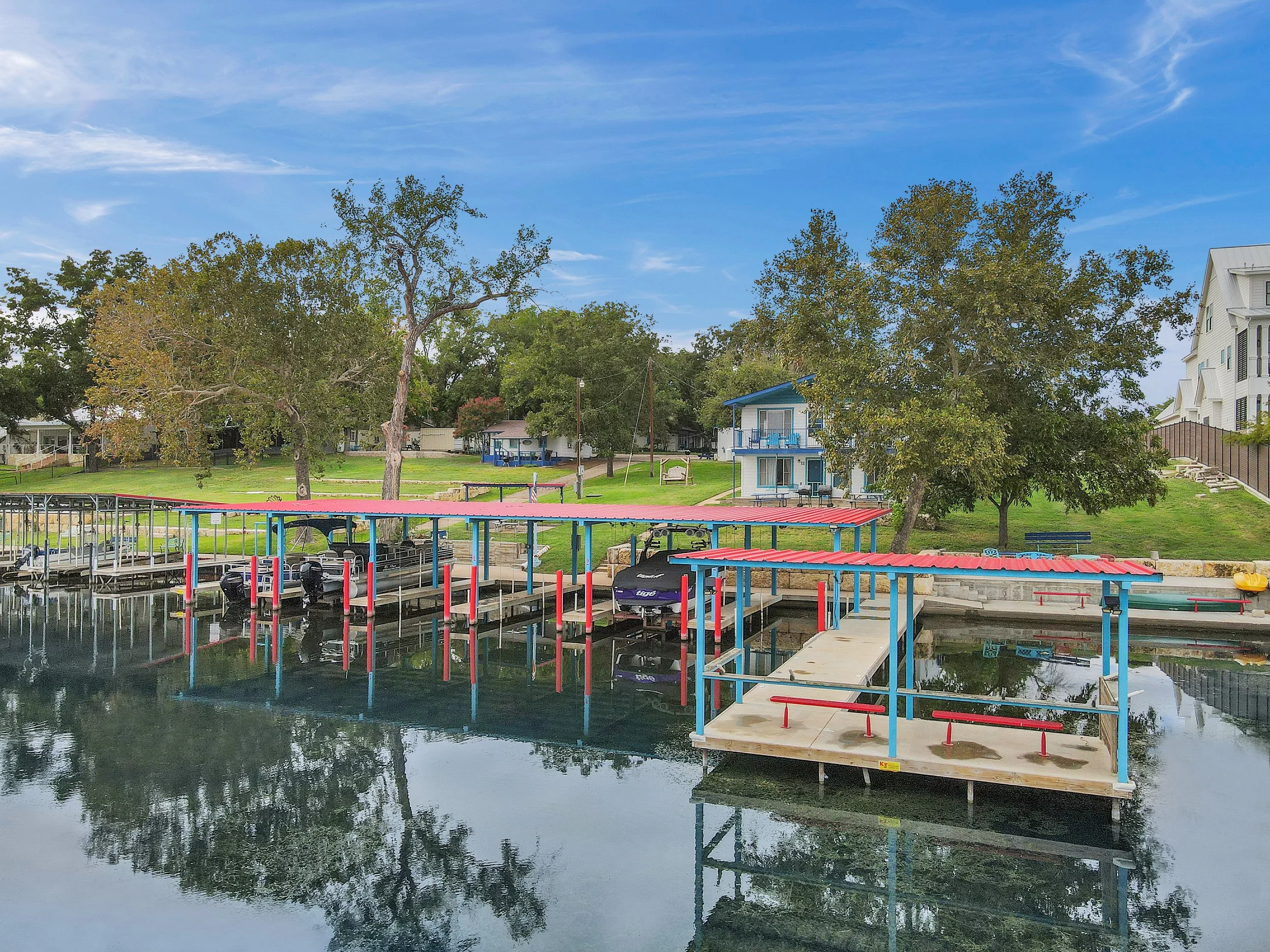 Aerial shot of dock, boat docks and shore of Valentine Lakeside