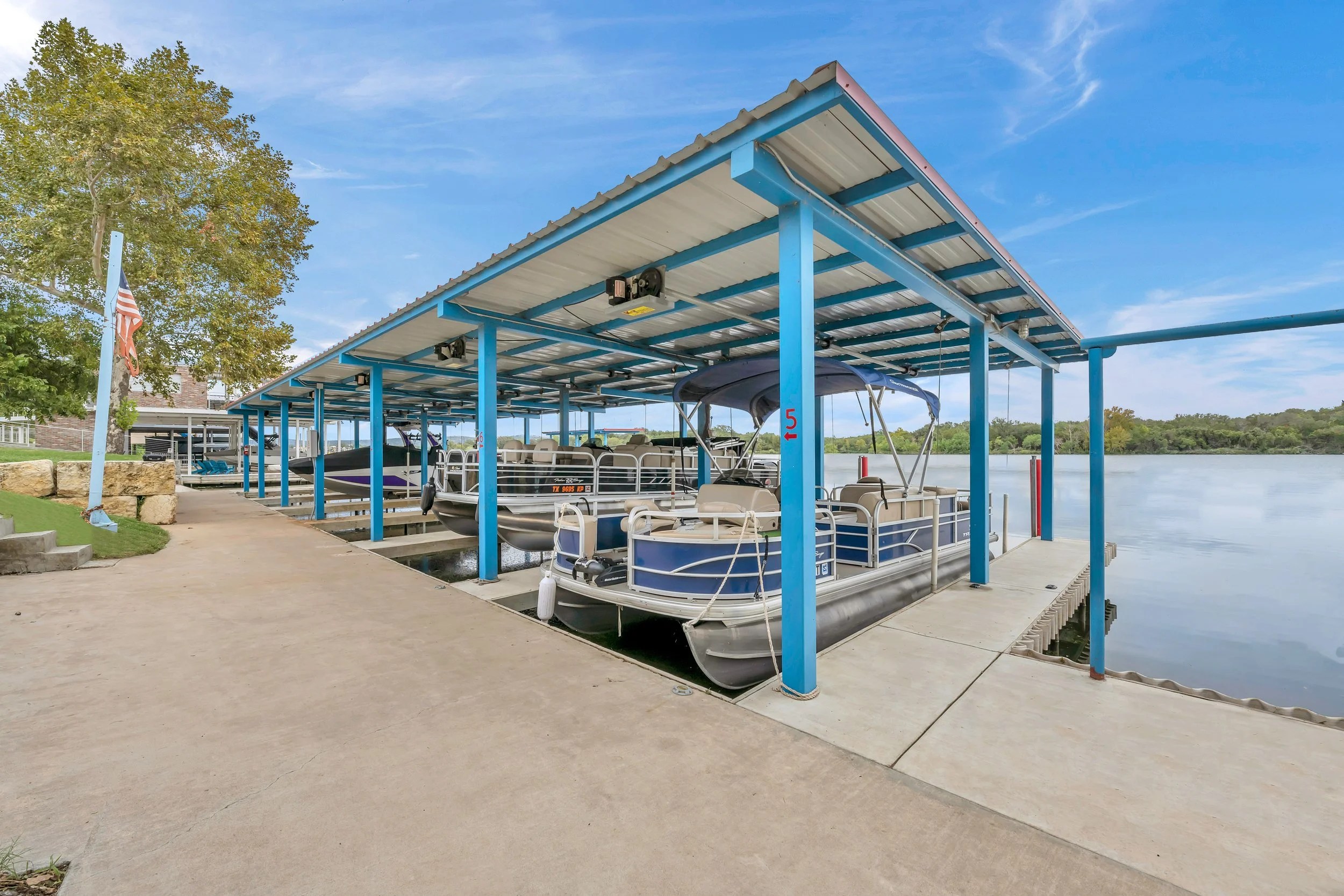 Pontoon boat in boat dock