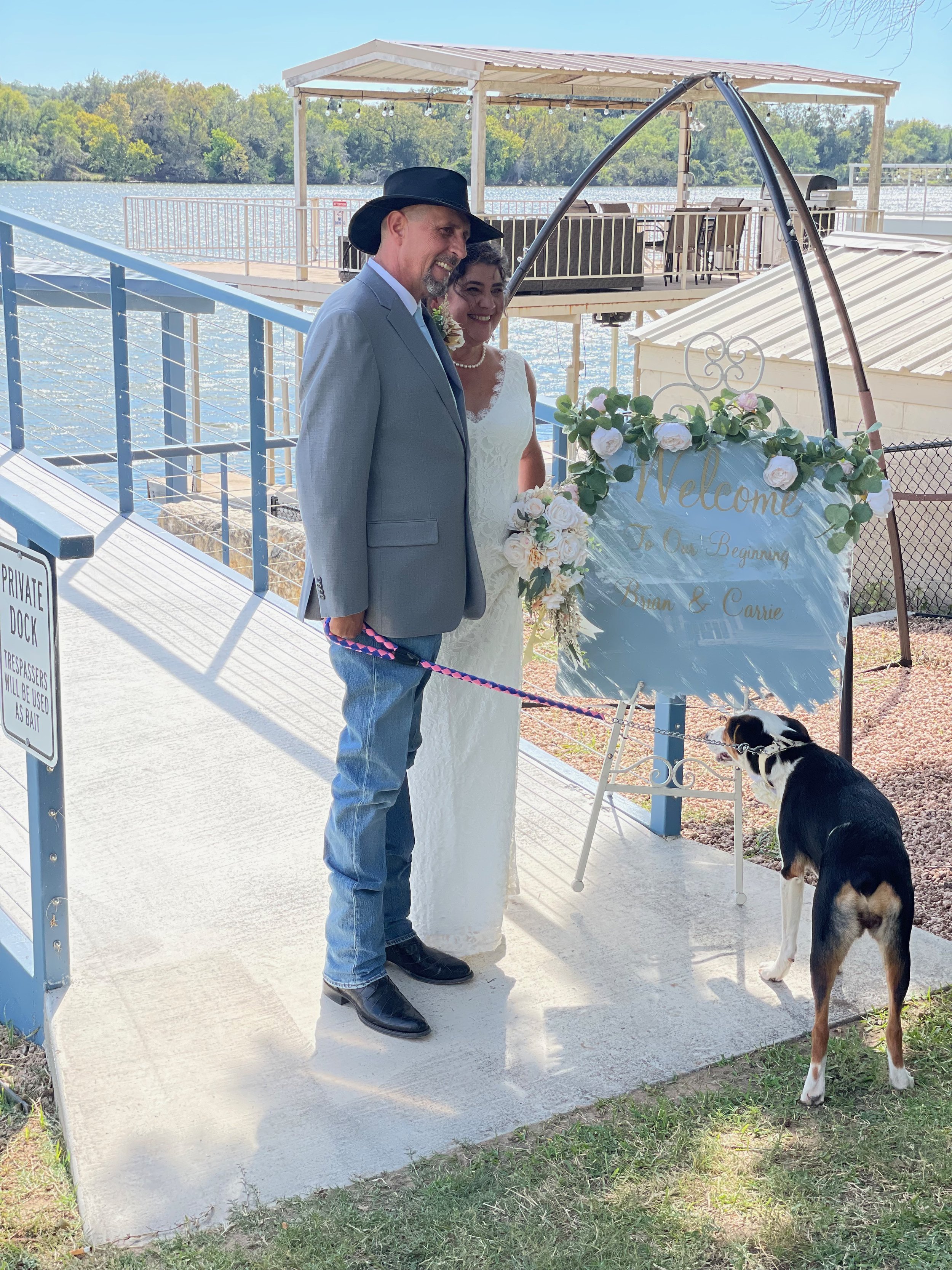 Newlywed couple with their dog