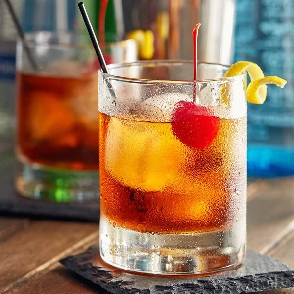 Cocktail glass shown with a mixed drink.
